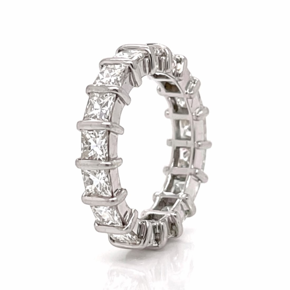 Platinum 3.40 Ct. Princess-cut Diamond Eternity Band: Platinum eternity band set with 17 princess-cut diamonds totaling approx. 3.40 ct (H–I color, VVS–VS clarity), delivering bold, continuous brilliance with a crisp, modern profile. A substantial, h