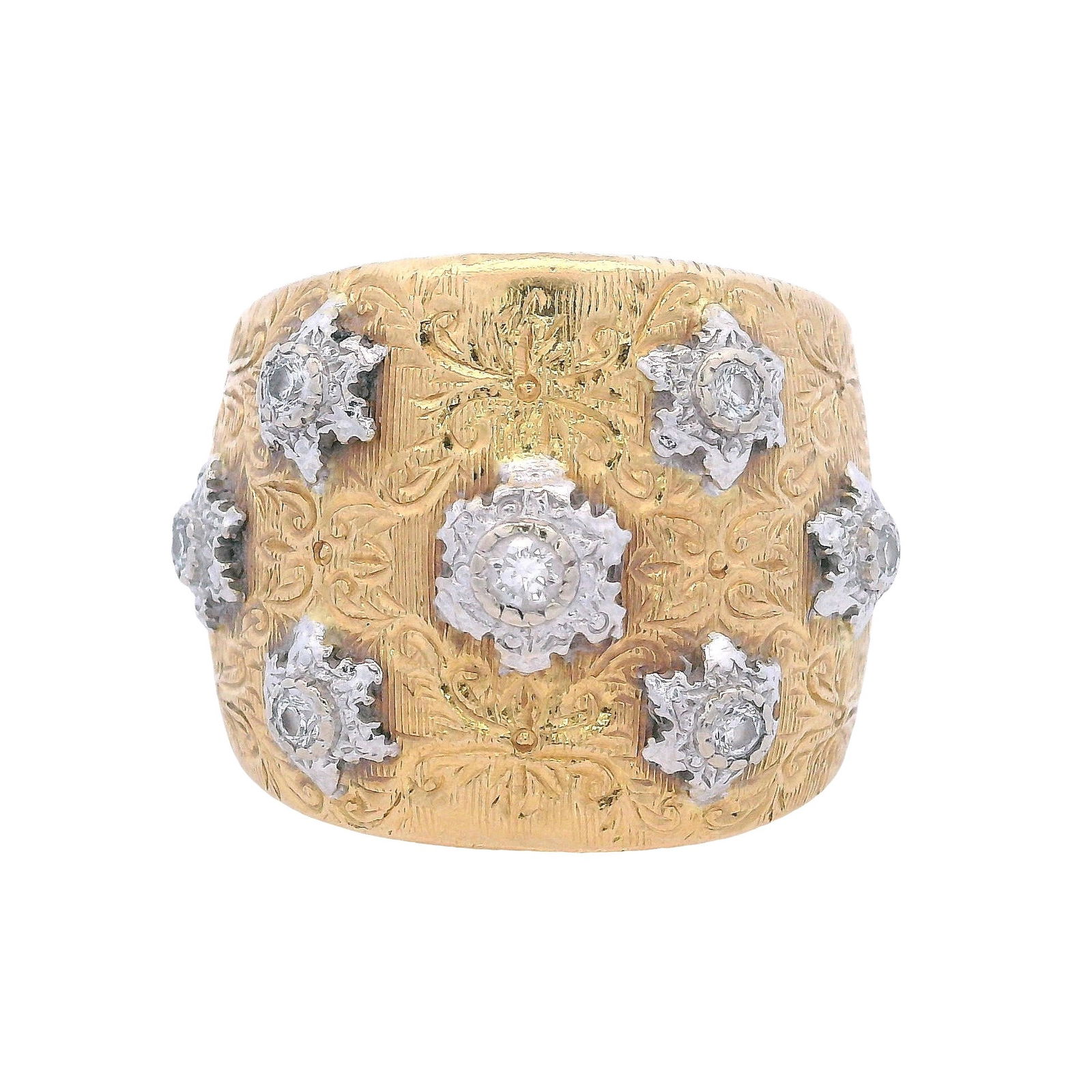 Vintage 18kt yellow & White Gold Ring with Diamonds: Nice looking Wide Ring crafted from 18kt yellow and white Gold. Accented with seven Round cut Diamonds weighing together Approx. 0.15 carats. H color, VS2 clarity. Ring size: 7 1/2. Total weight: 12.4