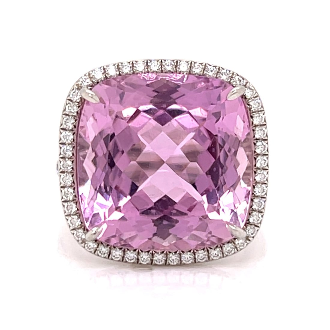 TIFFANY & CO. 14.50 Ct. Kunzite & Diamond Ring: TIFFANY & CO. platinum ring showcasing a luminous approx. 14.50 ct kunzite with brilliant faceting and saturated lilac-pink color, framed by a halo and shoulders set with 104 diamonds totaling approx.