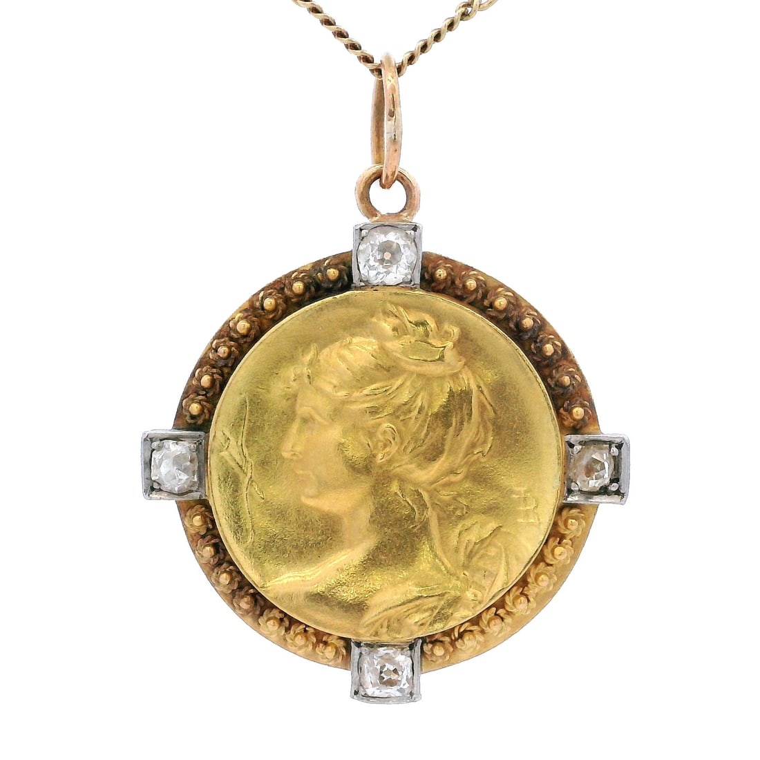 Art Nouveau 18kt yellow & white Gold Pendant with Diamonds: Art Nouveau 18K yellow and white gold medal pendant featuring a beautifully detailed profile motif, framed by 4 Old Mine diamonds totaling approx. 0.40 ct (H–J color, SI2 clarity) for subtle, period