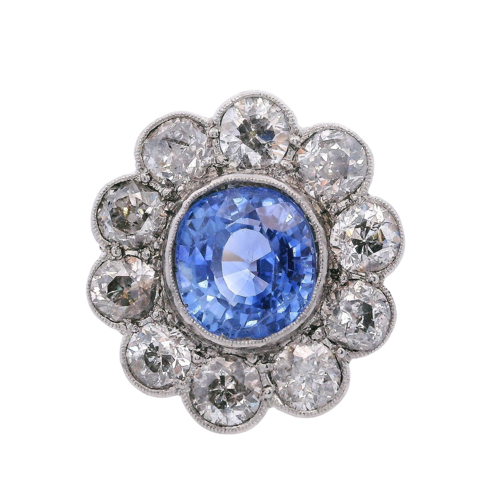 Antique Platinum Rosetta Ring with 2.80 Cts Ceylon Sapphire & Diamonds: Antique Rosetta Ring crafted from 18kt yellow Gold and Platinum, set with a center Round cut vivid Ceylon Sapphire of approx. 2.80 carats. Surrounded by 10 Old mine Diamonds weighing together Approx.