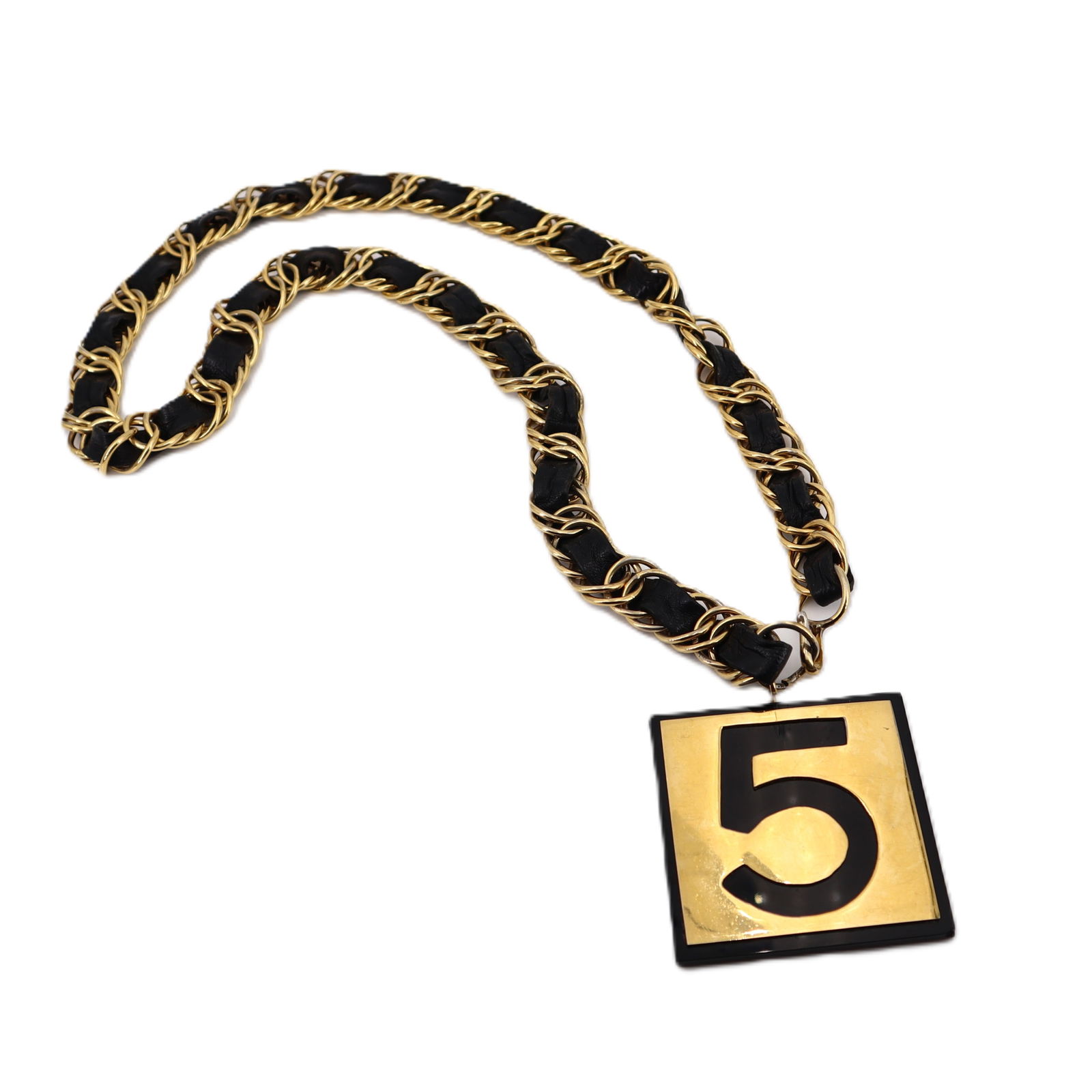CHANEL No.5 Square Leather Necklace Gold Tone: CHANEL No.5 Square Leather Necklace Gold Tone. Chain length: 39 inches. Pendant measurements: 2.4 x 2.4 inches.Material: Black leather and Metal with Gold tone. Made in France.