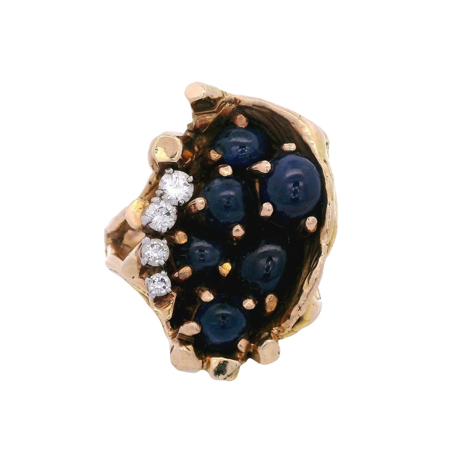 Mid-Century Sculptural 14kt yellow Gold Ring with Sapphires & Diamonds: Bold mid-century sculptural ring crafted in 14K yellow gold (stamped “14K, E”), designed with an organic, dimensional dome setting showcasing six cabochon blue sapphires totaling approximately