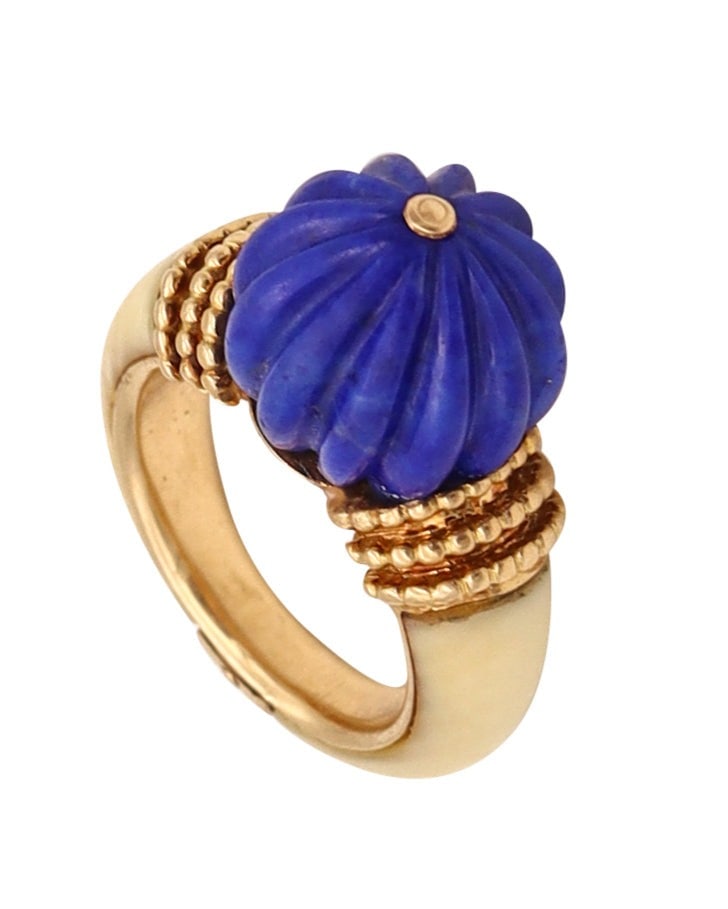 Boucheron Paris 1970 Classic Cocktail Ring In 18Kt Yellow Gold With Blue Lapis & Coral: A classic colorful ring by Boucheron, Paris, crafted circa 1960s–1970s in solid 18K yellow gold with elegant twisted wire detailing. The sculptural design is centered with a fluted sphere of natural