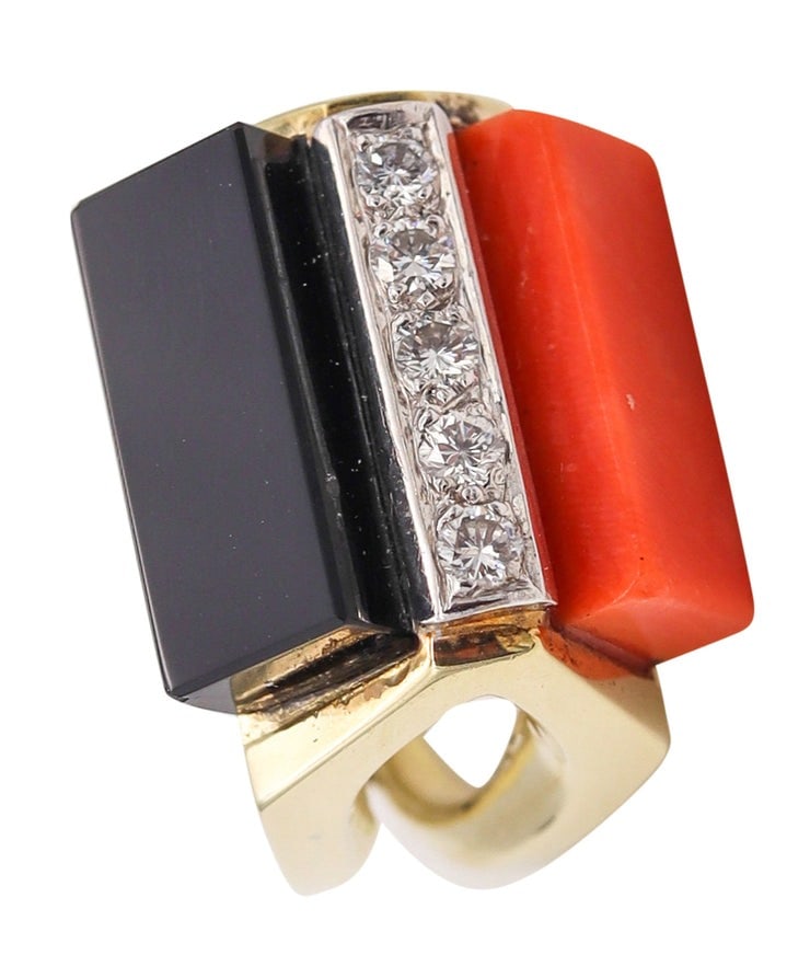 La Triomphe Geometric Cocktail Ring In 18Kt Gold With Diamonds Coral Onyx: A modernist three-dimensional geometric cocktail ring by La Triomphe, designed in New York City circa early 1970s and crafted in solid 18K yellow gold with a high-polish finish. The bold top features