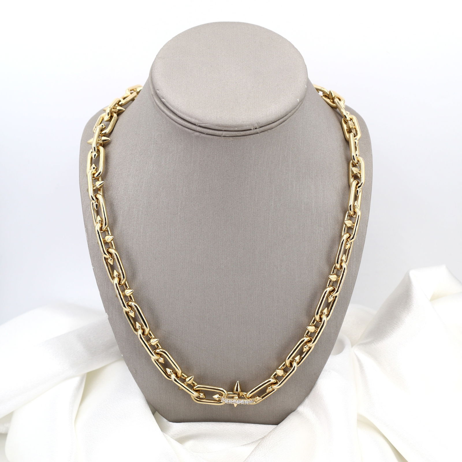 Tiffany Titan by Pharrell Williams Clasp 24 in Necklace in Yellow Gold with Diamonds: Building on the House’s legacy of collaborating with visionary artists, Tiffany Titan by Pharrell Williams is an expression of rebellion as a catalyst for creativity. These designs draw inspiration