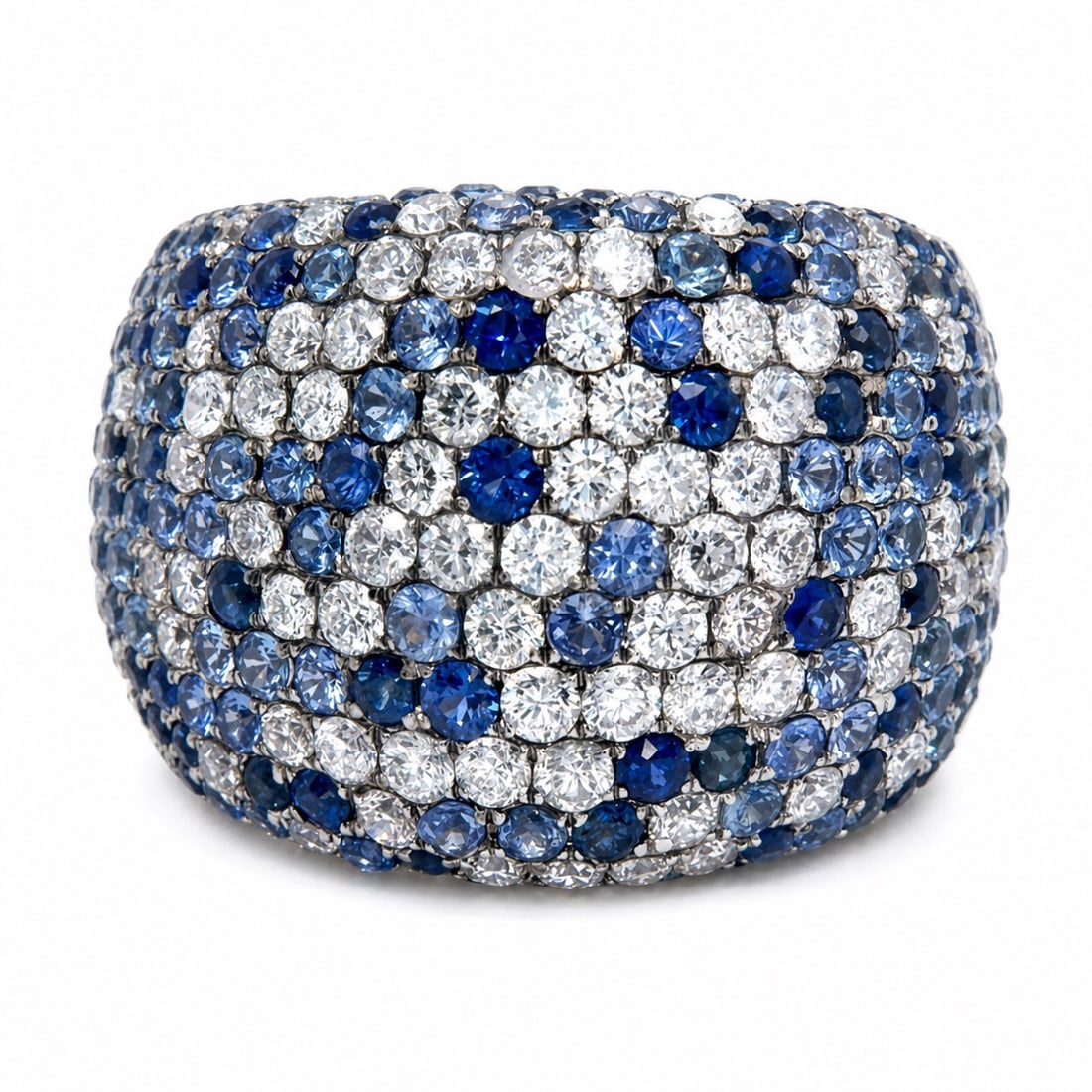 18K White Gold Sapphire & Diamond Ring: 18K White Gold Sapphire & Diamond Ring, weighing 14.9 grams, richly pavé-set with 79 diamonds totaling approx. 2.40 cts (G–I color, VS1–SI2 clarity) alongside a sweeping pavé of sapphires