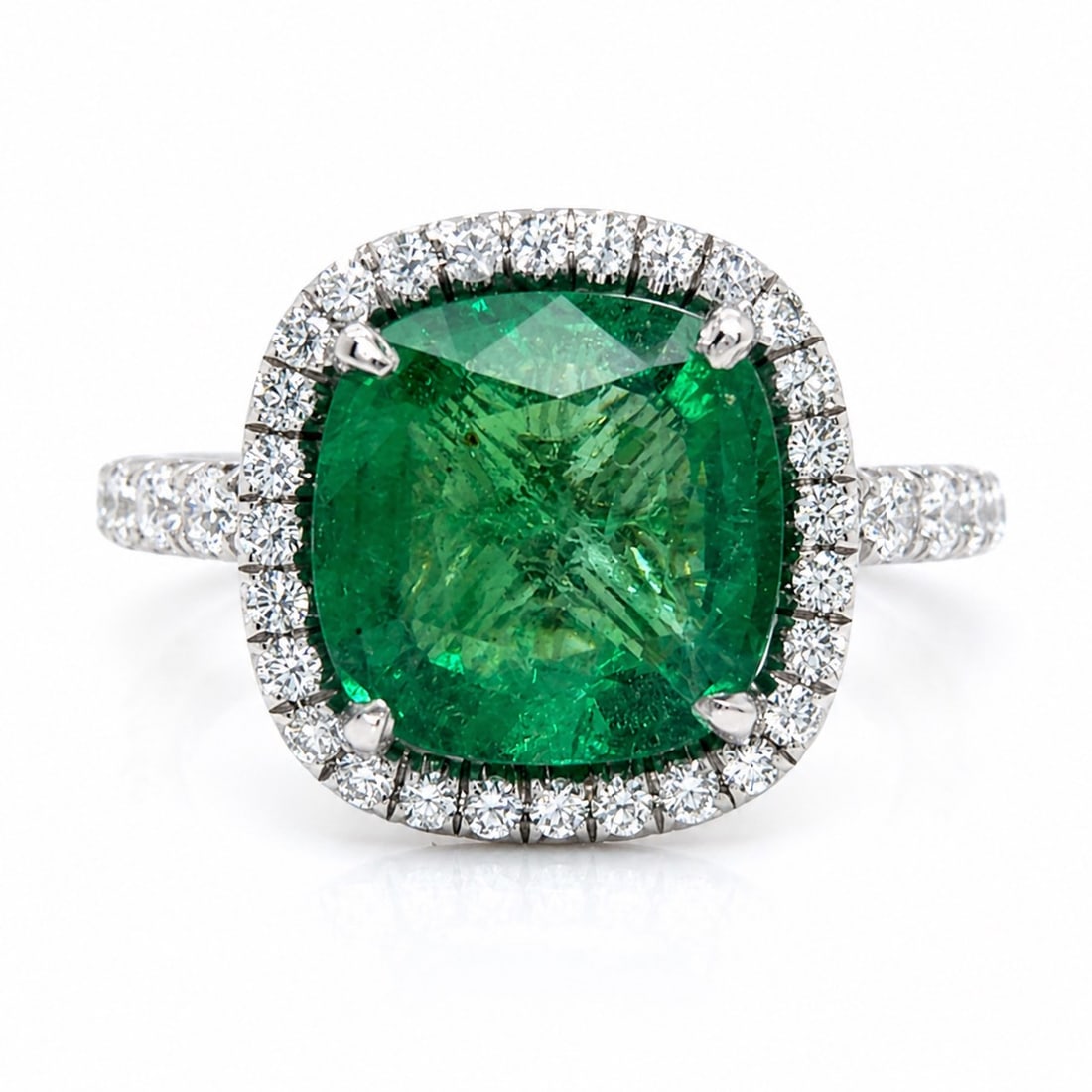 Platinum 3.50 Ct. Emerald & Diamond Ring: Platinum Emerald & Diamond Ring, weighing 6.5 grams, set with an impressive approx. 3.50 ct emerald and accenter by approx. 1.10 cts of diamonds (F–G color, VVS–VS clarity) for crisp, icy brillian