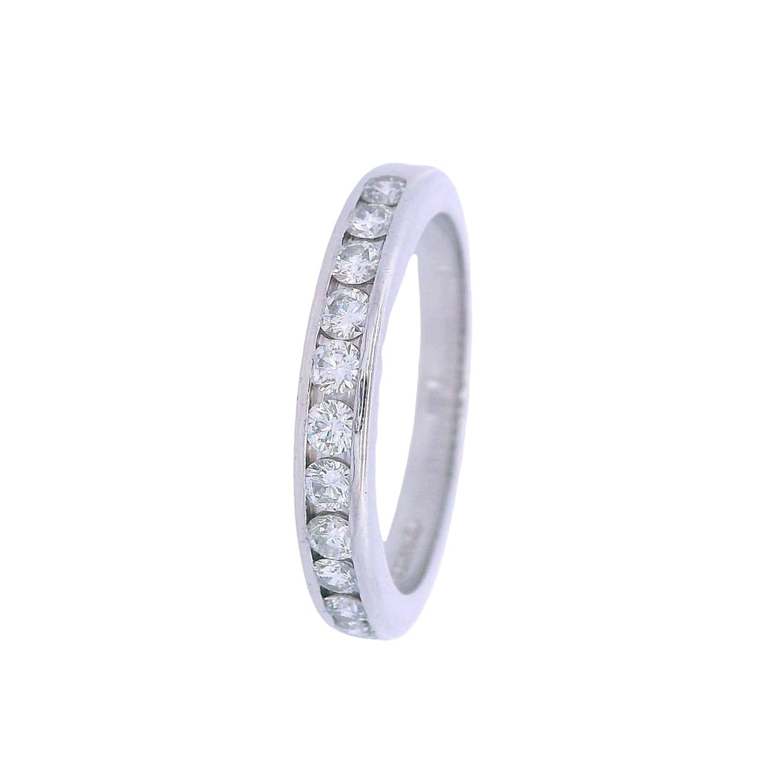 Tiffany & Co Platinum Anniversary Wedding Band with 0.45 Cts in Diamonds: Tiffany & Co. Half Eternity wedding Band crafted from Platinum. Set with 0.45 carats. F-G color, VS1 clarity. Ring size: 6. Total weight: 5.2 grams. Ring width: 3.2 mm. Stamped: "Tiffany & Co. Pt950".