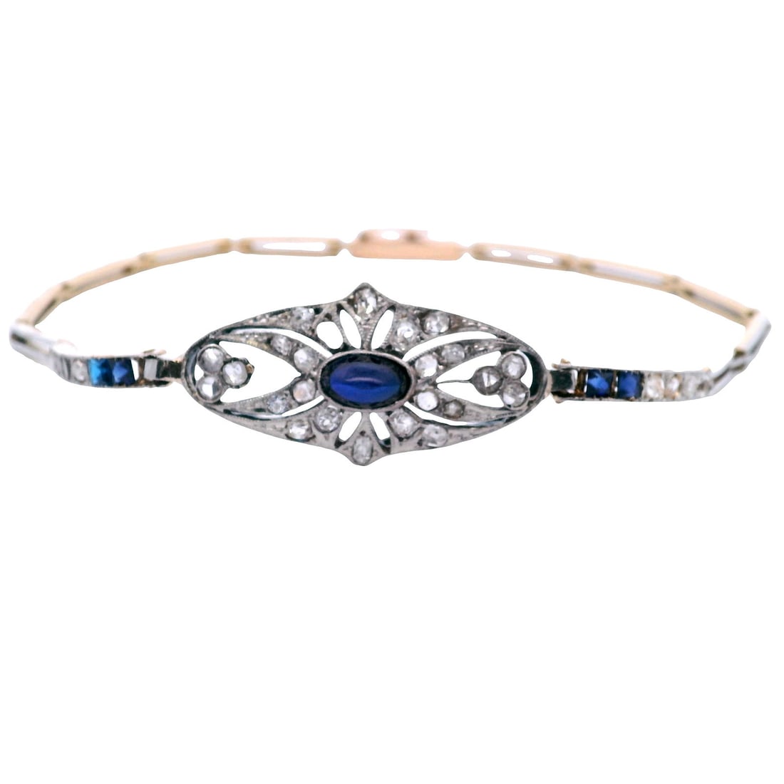 18K Yellow Gold & Platinum Bracelet with 1.00 CTW in Sapphire & Diamond: Art Deco 18K yellow gold & platinum-topped bracelet, weighing 7.5 grams, featuring a center cabochon blue sapphire totaling approx. 1.00 ct with a rich, velvety glow. Accenter with rose-cut diamonds a