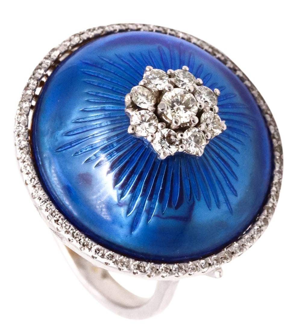 Modernist Cocktail Ring In 18kt white Gold With Blue Enamel And 1.08 Cts Diamonds: Very handsome and colorful modernist piece, created in the early 1970's. It was carefully crafted in solid 18 karats white gold and finished, with very high polish. The domed part is embellished with 