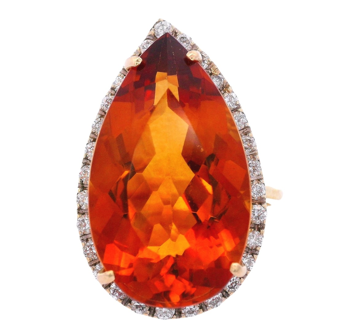 18K Yellow Gold Cocktail Ring with 12.45 CTW in Topaz & Diamond: 18K yellow gold cocktail ring featuring a vivid yellow topaz centerpiece weighing approximately 12.00 carats, framed by 30 sparkling diamonds totaling approximately 0.45 carats (graded colorless) for 