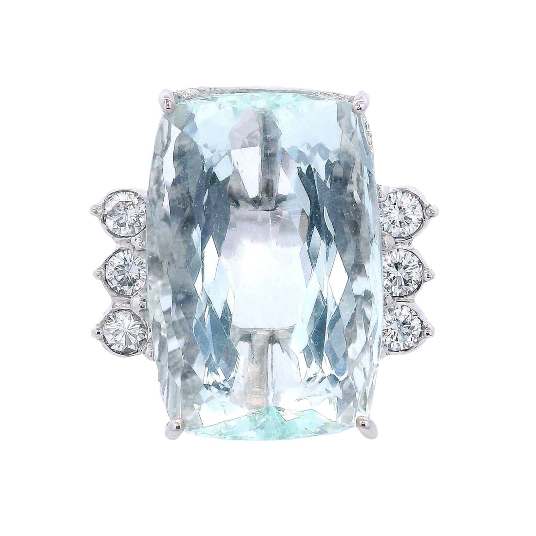 18K White Gold Cocktail Ring with 19.60 CTW in Aquamarine & Diamond: 18K white gold cocktail ring featuring a luminous faceted Brazilian aquamarine weighing approximately 19.00 carats, beautifully accenter by six diamonds totaling approximately 0.60 carats (VS1–VS2 c