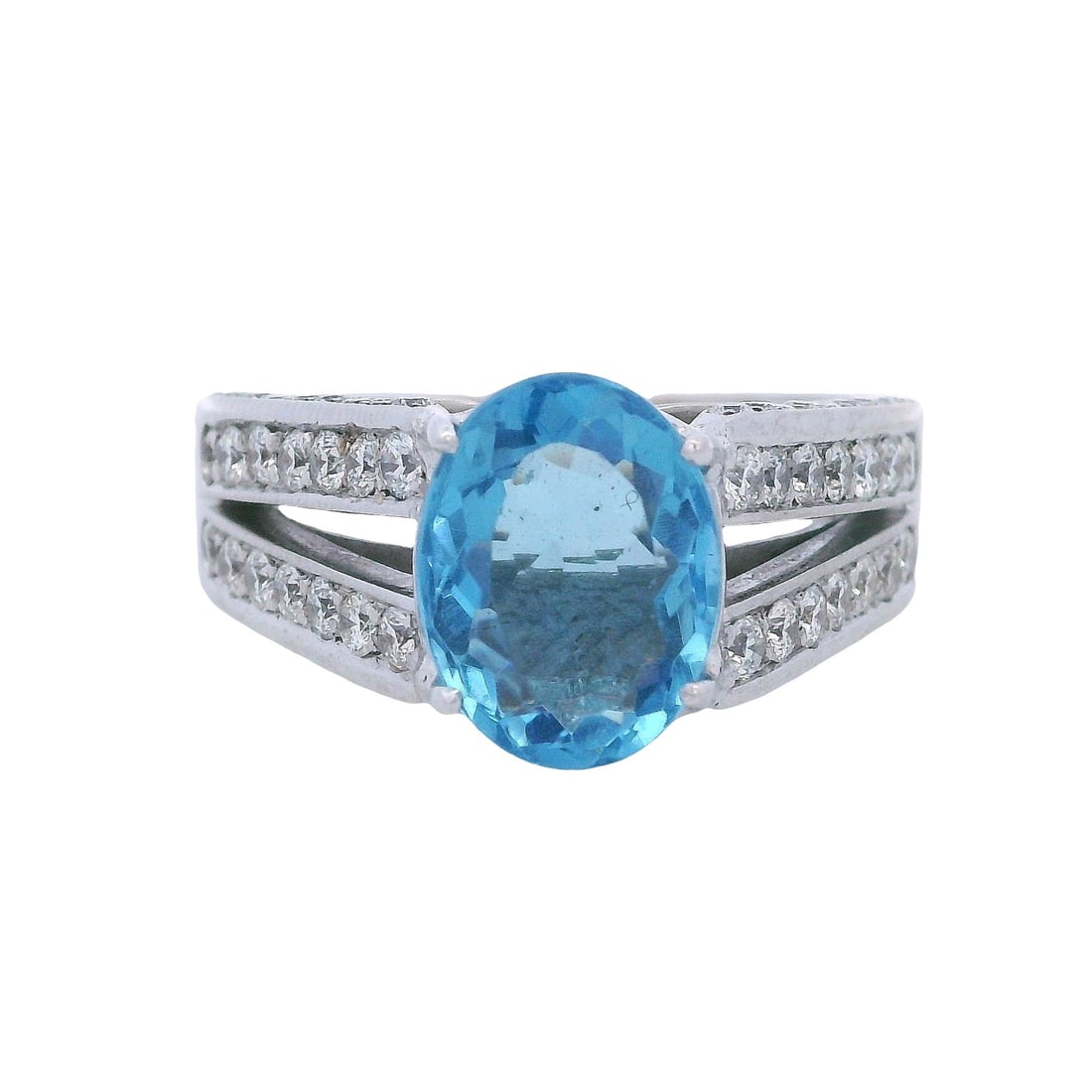 18K White Gold Cocktail Ring with 6.00 CTW in Aquamarine & Diamond: 18K white gold cocktail ring featuring a Brazilian aquamarine centerpiece weighing approximately 4.00 carats, surrounded by an exceptional 112 diamonds totaling approximately 2.00 carats (G–H color,