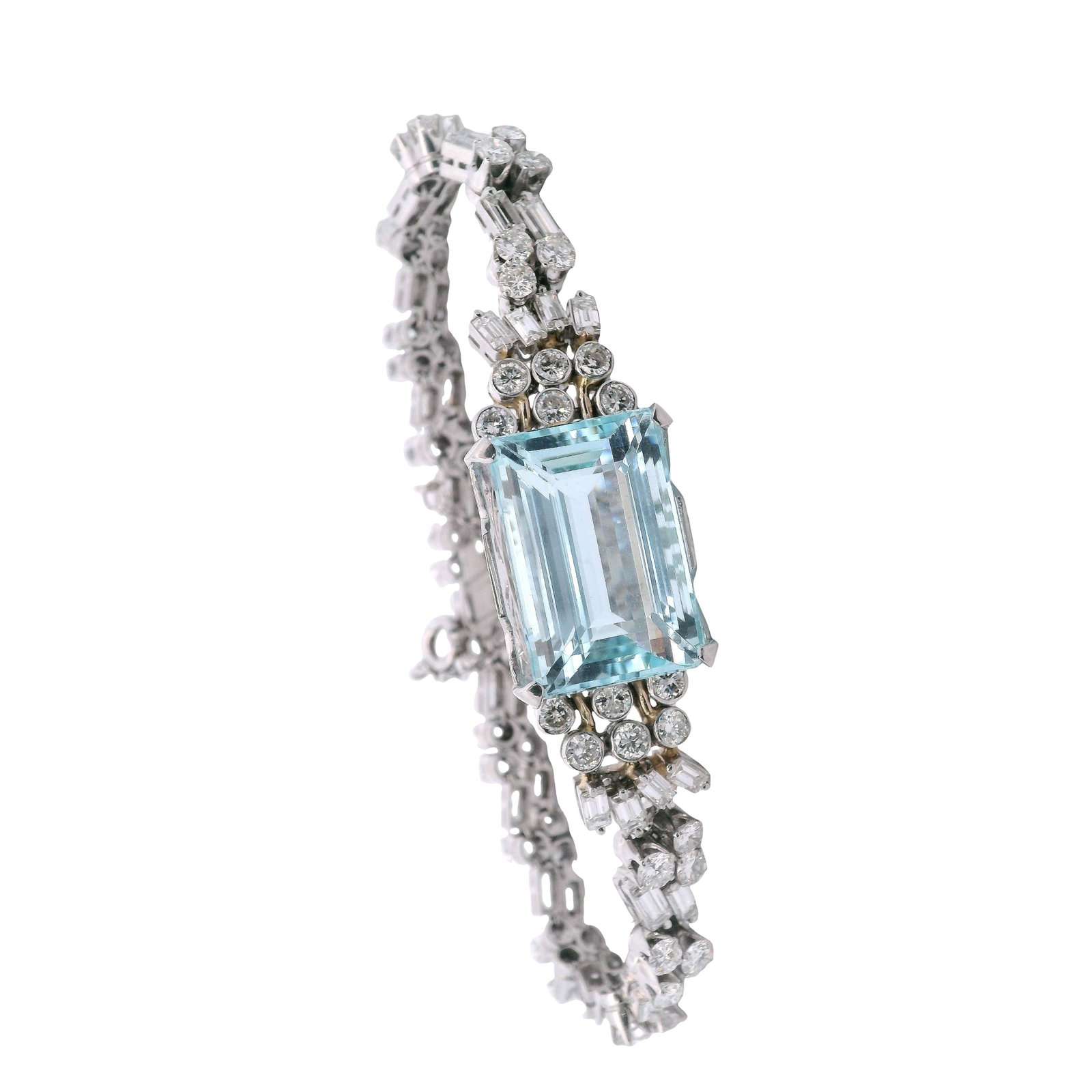 Vintage Platinum Bracelet with 26.10 CTW in Aquamarine & Diamond: Vintage Platinum Aquamarine & Diamond Bracelet, weighing 30.9 grams, featuring a spectacular emerald-cut Brazilian aquamarine totaling approx. 17.80 cts as the commanding center stone. Accenter by 54 