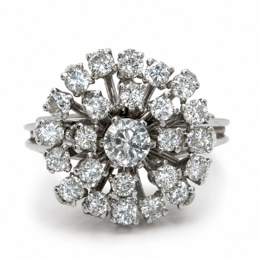 Retro Platinum Ring with 1.40 CTW in Diamond: 1950s platinum ring in a dramatic starburst cluster design, set with 25 diamonds totaling approximately 1.40 ctw, graded F–H color and VS1–SI1 clarity for lively brilliance. Weighs 10.1 grams and 