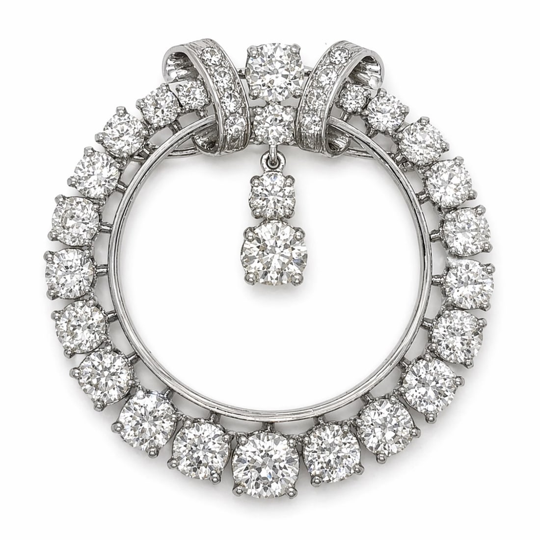 Art Deco Platinum Brooch/Pendant with 9.30 CTW in Diamond: Art Deco Platinum Diamond Brooch and Pendant, weighing 18.2 grams, set with 25 old mine diamonds totaling approx. 9.00 cts, accenter by an additional 8 diamonds totaling approx. 0.30 ct (combined appr