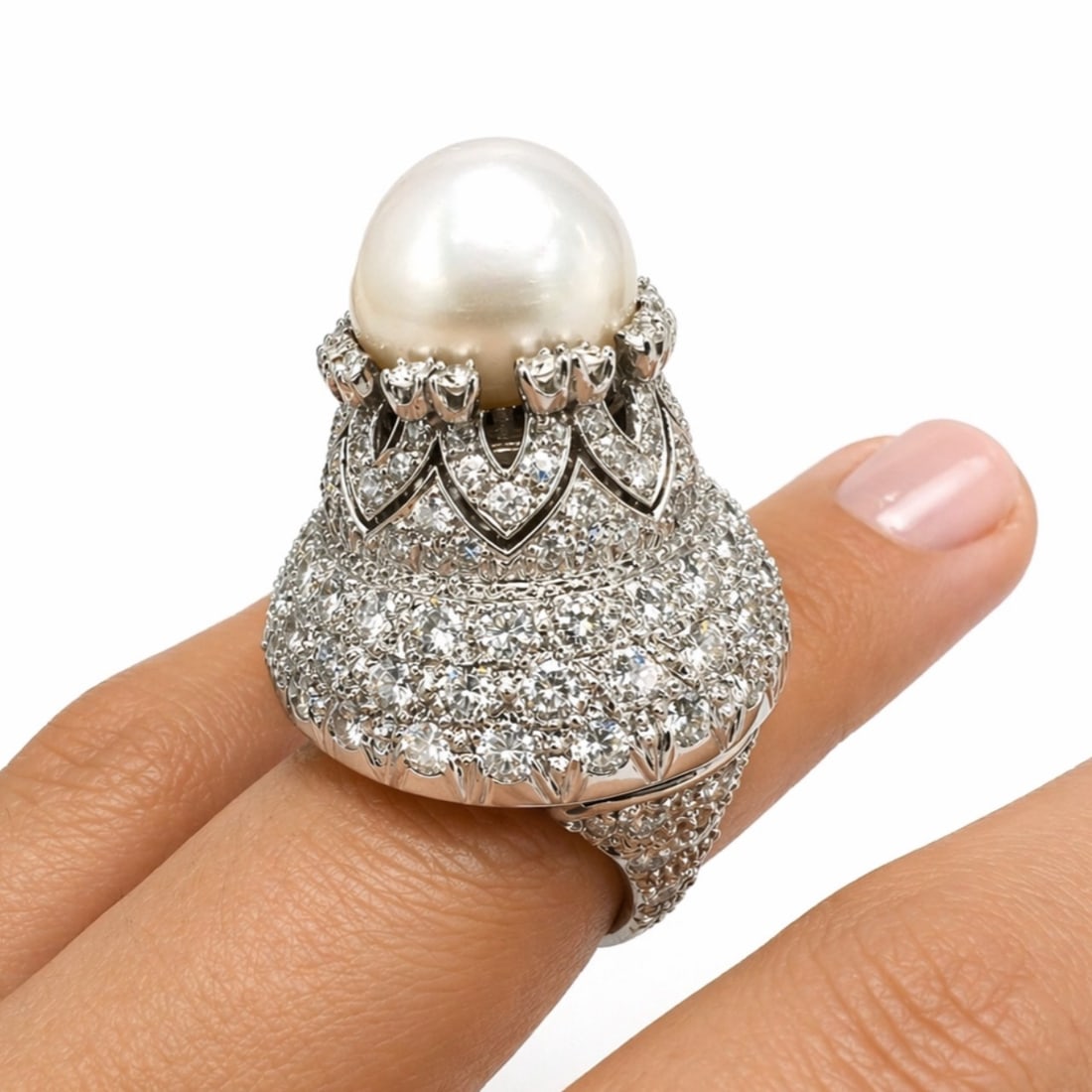 Platinum Ring with 13.80 CTW in Diamond, and South Sea Pearl: Platinum South Sea Pearl & Diamond Cocktail Ring, weighing an impressive 35.9 grams, centered by a luminous 14.95 mm South Sea pearl and lavishly set with approx. 13.80 cts of European-cut diamonds (F