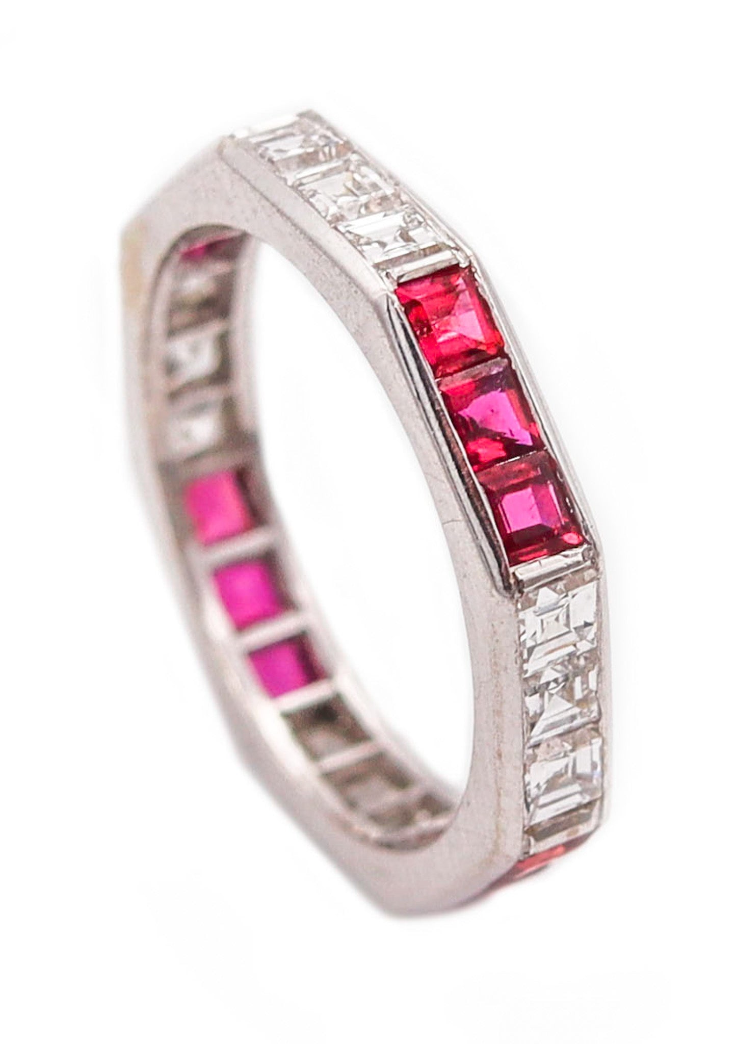 ENGLAND 1970 Octagonal Eternity Ring 18Kt Gold With 2.16 Ctw In Diamonds & Rubies: London, England (1992). Octagonal eternity band in high-polish 18K white gold with smooth facets, channel-set with 12 French carré-cut diamonds totaling approx. 0.96 ct (E/F, VS2) and 12 French squar