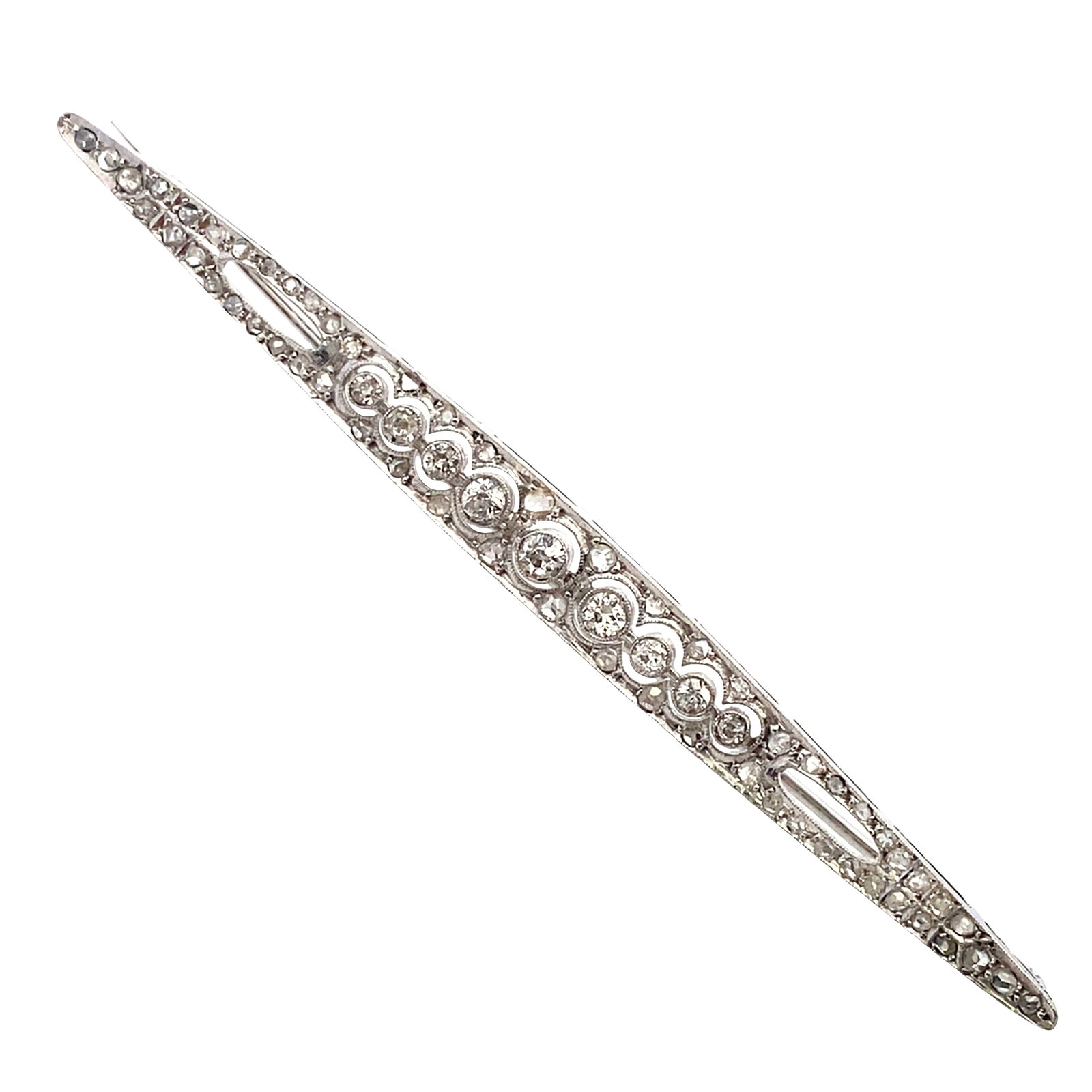 Art Deco Platinum Pin Brooch with 1.40 Cts in Diamonds: Art Deco Platinum Pin Brooch withaccenter with Old mine and Rose cut Diamonds weighing together Approx. 1.40 Cts in Diamonds. H-J color, VS-SI1 clarity. Length: 3.75 inches. Total weight: 8.1 grams.