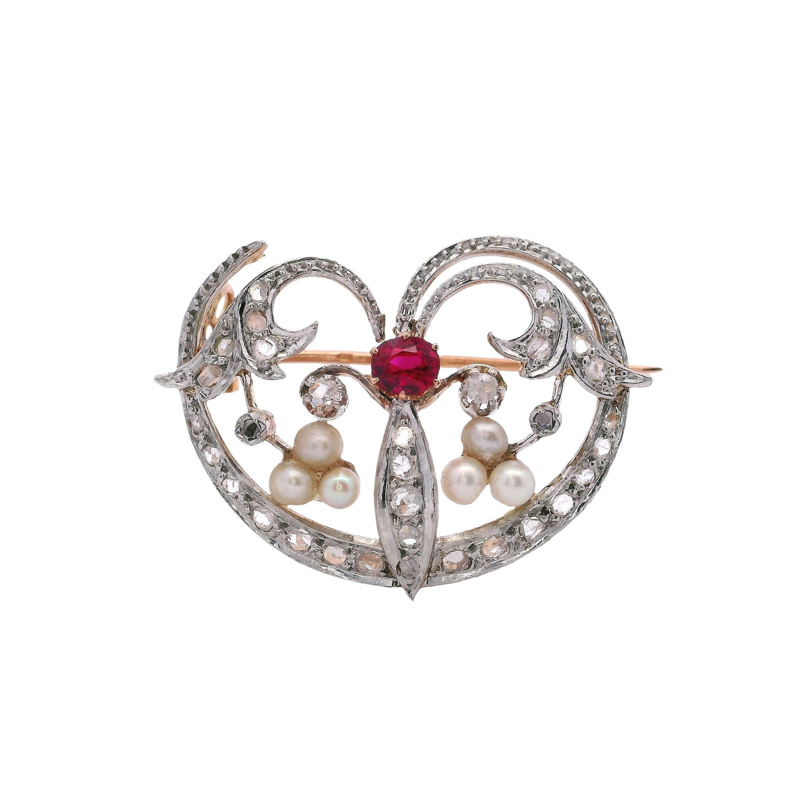 Art Nouveau 18kt Gold & Platinum Brooch with Ruby, Diamonds & Pearls: Art Nouveau Brooch crafted from 18kt yellow Gold and Platinum. Featuring a center Oval Ruby of Approx. 0.25 carats. Accenter with Rose cut Diamonds and Pearls. Measurements: 1.15 x 0.85 inches. Total 