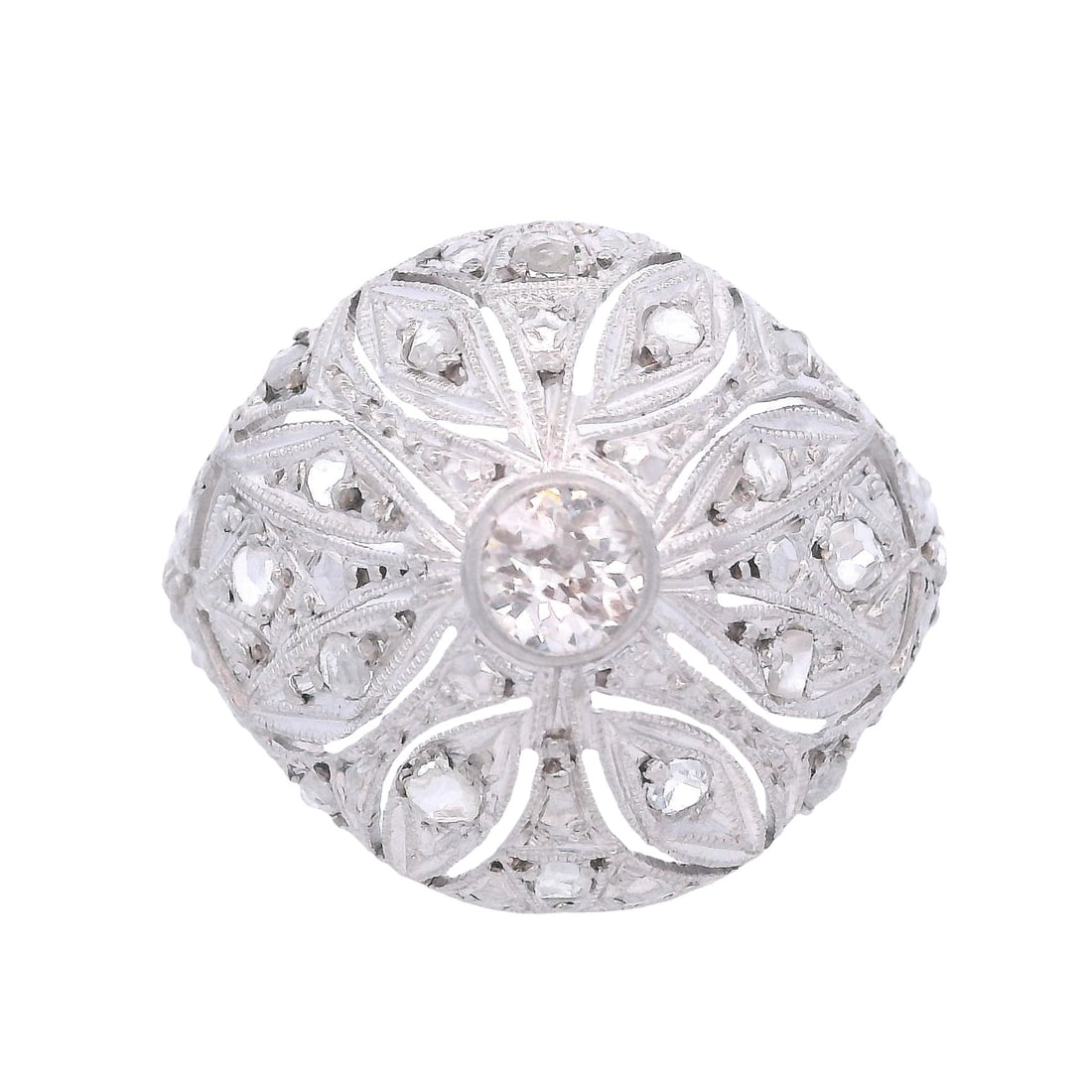 Art Deco Filigree Platinum Ring with Diamonds: Circa 1920s. Art Deco Filigree Ring crafted from Platinum. Accenter with a center Old mine Diamond of Approx. 0.18 carats. L color, VS2 clarity. Accenter with Rose cut Diamonds. Ring size: 7. Total we