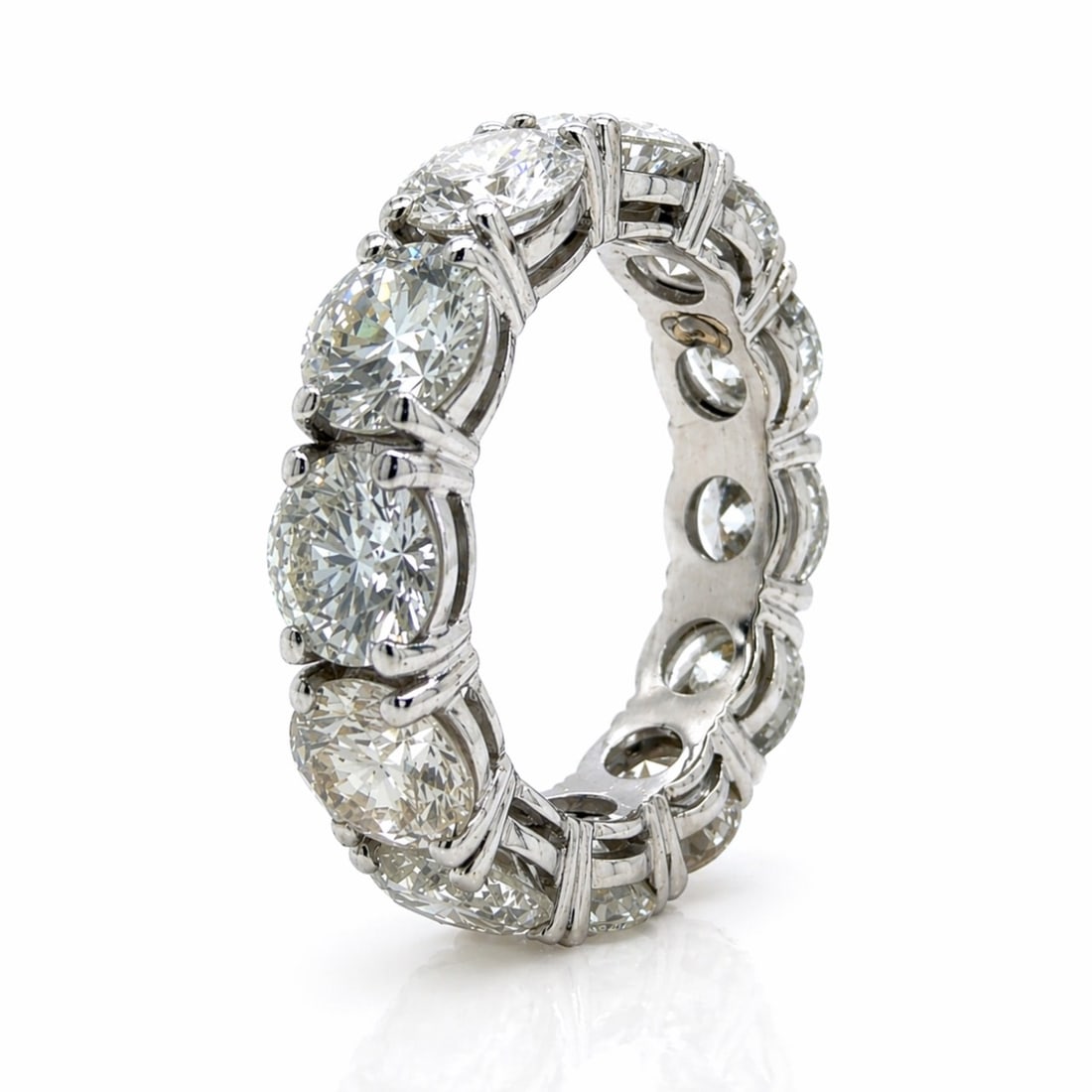 Platinum Band with 6.20 CTW in Diamond: Platinum Diamond Eternity Band, weighing 5.1 grams, set with 12 diamonds totaling approx. 6.20 cts (F–I color, VS2–SI2 clarity) in a bold, continuous eternity design for nonstop brilliance around 