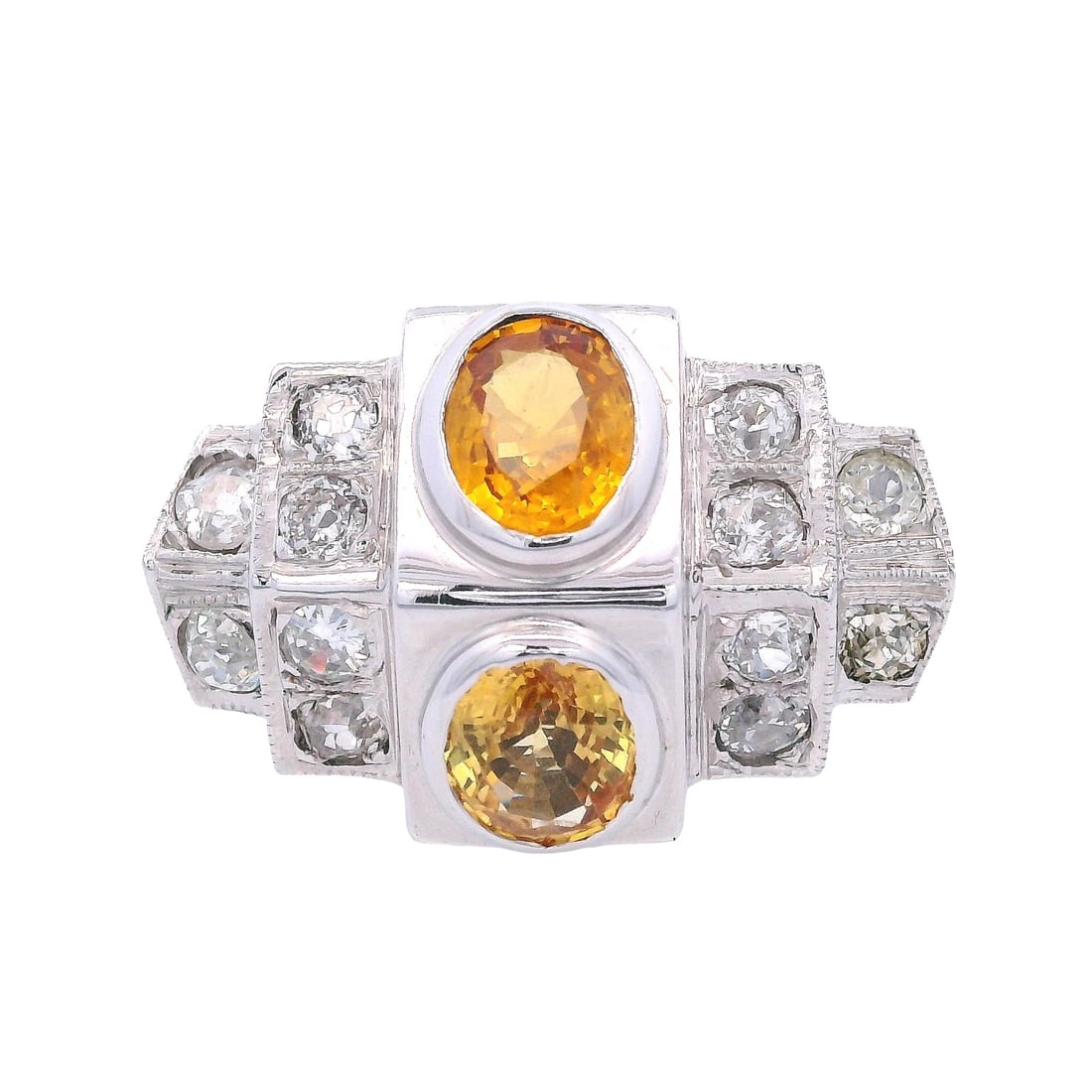 Art Deco 18kt Gold Ring with Diamonds & Yellow Sapphires: Art Deco 18kt white Gold Ring featuring two Oval cut yellow Sapphires weighing Approx. 2.45 carats. Accenter with 12 Old mine Diamonds weighing Approx. 1.20 carats. LJ-K color, VS2-SI1 clarity. Ring s