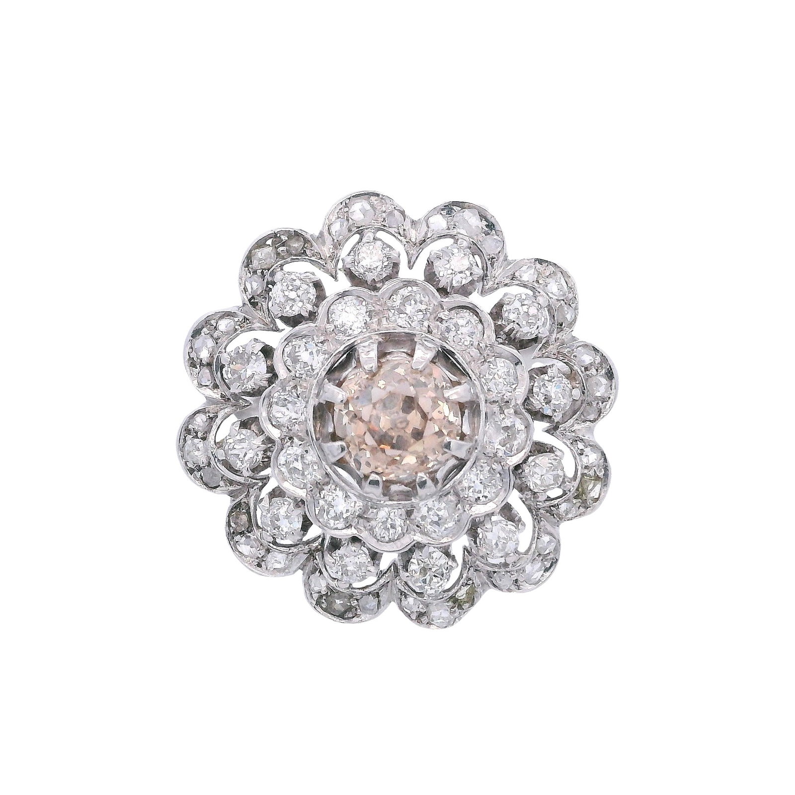 Vintage Platinum Cocktail Ring with Diamonds: Vintage Cocktail Ring crafted from Platinum featuring a center Old mine Brown Diamond of Approx. 1.07 carats. SI2 clarity. Along with Old mine cut and Rose cut Diamonds weighing together Approx. 1.00 