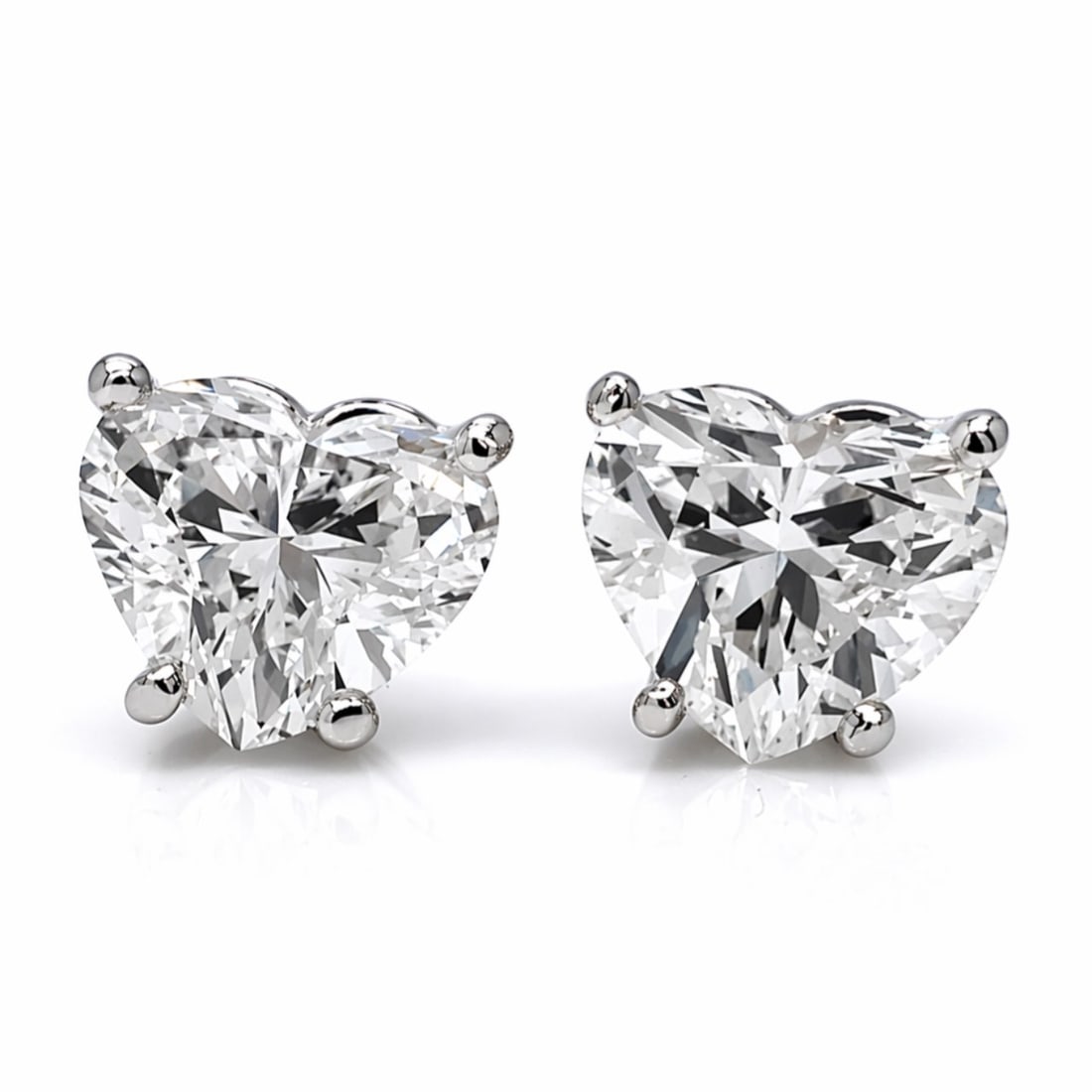 18K White Gold 2.30 Ct. Heart-shape Diamond Stud Earrings: 18K White Gold Diamond Stud Earrings, weighing 1.7 grams, set with two heart-shaped diamonds totaling approx. 2.30 cts (H–I color, SI1–SI2 clarity) for bold, high-impact sparkle with a romantic si