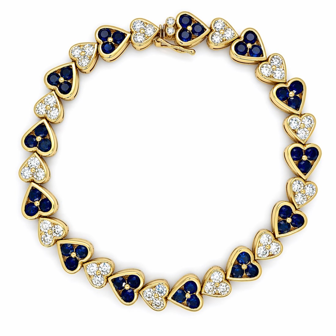 18K Yellow Gold Bracelet with 7.00 CTW in Diamond & Sapphire: 18K Yellow Gold Diamond & Sapphire Heart Bracelet, weighing 17.7 grams, set with 39 diamonds totaling approx. 3.10 cts (G–H color, VVS–VS clarity) and 39 sapphires totaling approx. 3.90 cts for a 