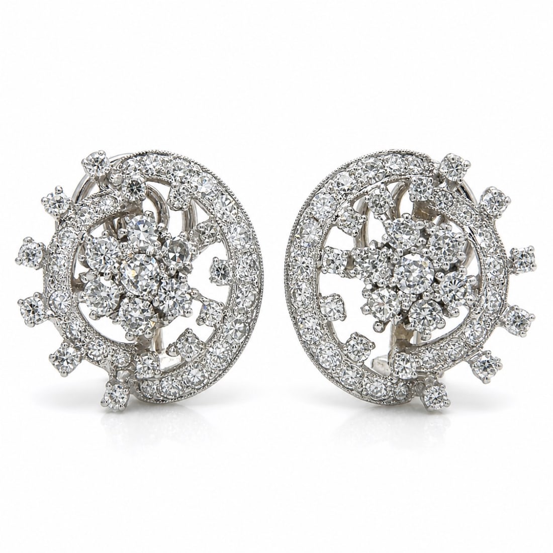 Art Deco Platinum Earrings with 2.70 CTW in Diamond: Art Deco Platinum Diamond Earrings, weighing 10.8 grams, set with 78 diamonds totaling approx. 2.70 cts (G–I color, VS2–I1 clarity) in a bold, dimensional swirl-and-cluster design that delivers sp