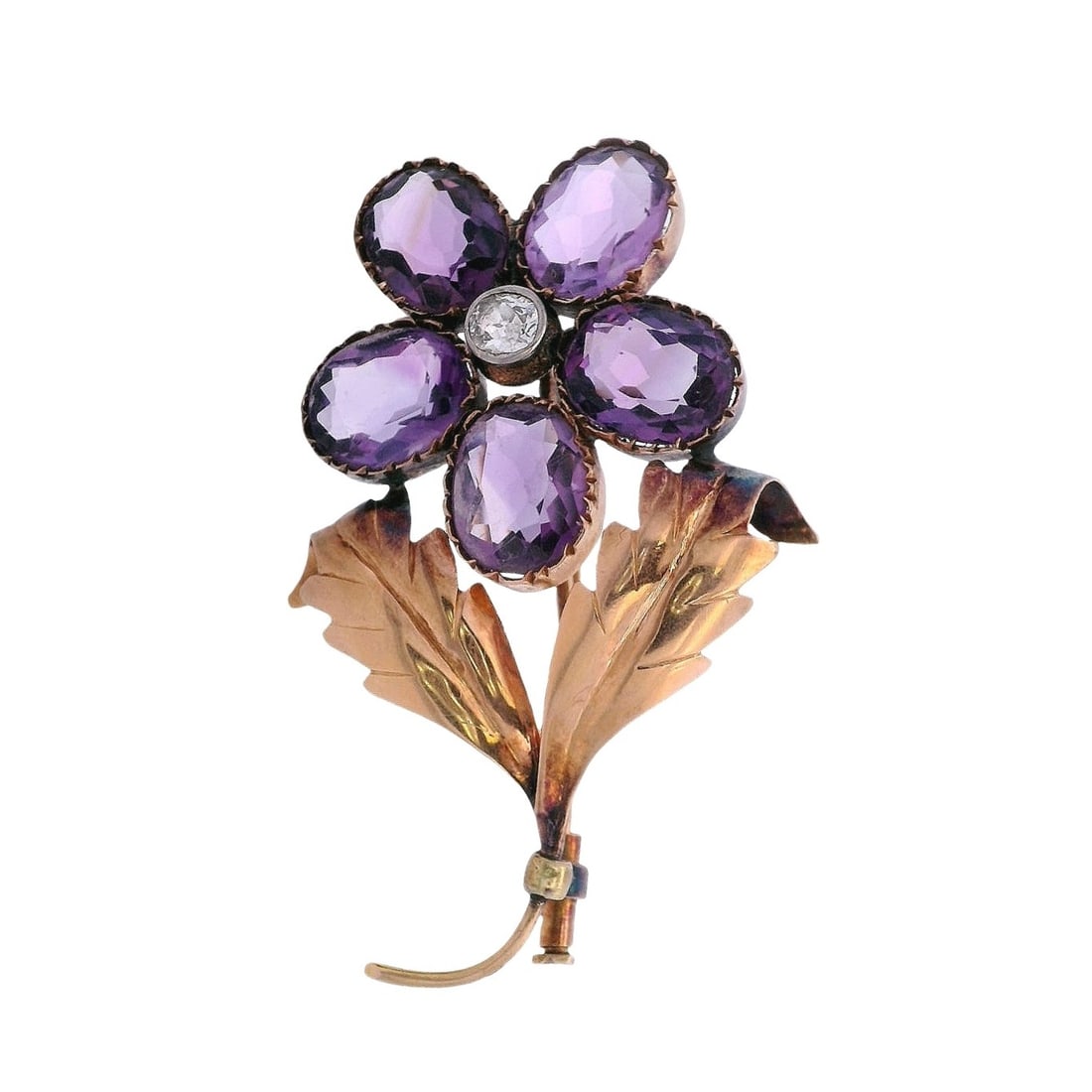 Retro 18kt yellow Gold Brooch with Diamonds & Amethyst: Retro Flower Brooch crafted from 18kt yellow Gold, accenter with five Oval cut Amethyst weighing Approx. 15.0 carats. Along with a center Old mine Diamond of 0.40 carats. J color, SI1 clarity. Measure