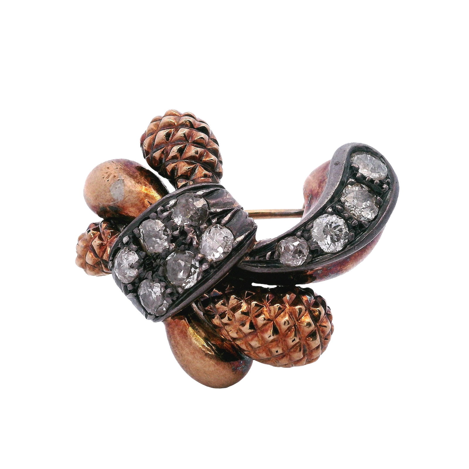 Antique 14kt yellow Gold & Silver Brooch with 1.10 Cts Diamonds: Antique 14kt yellow Gold and Silver Brooch. Accenter with 10 Old mine Diamonds weighing Approx. 1.10 carats. Total weight: 9.8 grams. Measurements: 1.10 x 1.00 grams.