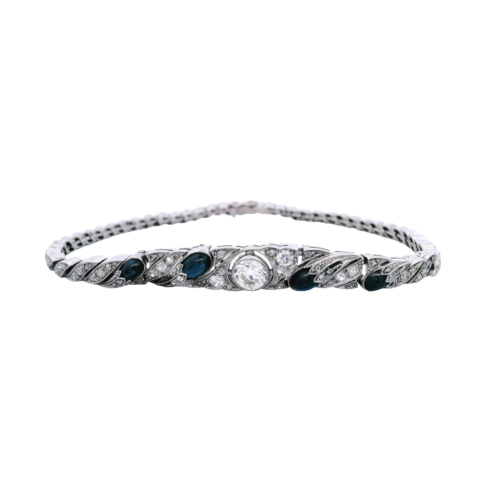 Hallmarked Art Deco Platinum Bracelet with 5.50 CTW in Diamond & Sapphire: Art Deco platinum bracelet featuring a center old European-cut diamond weighing approximately 0.90 carats (J color, VS1 clarity), complemented by old mine- and rose-cut diamonds totaling approximately