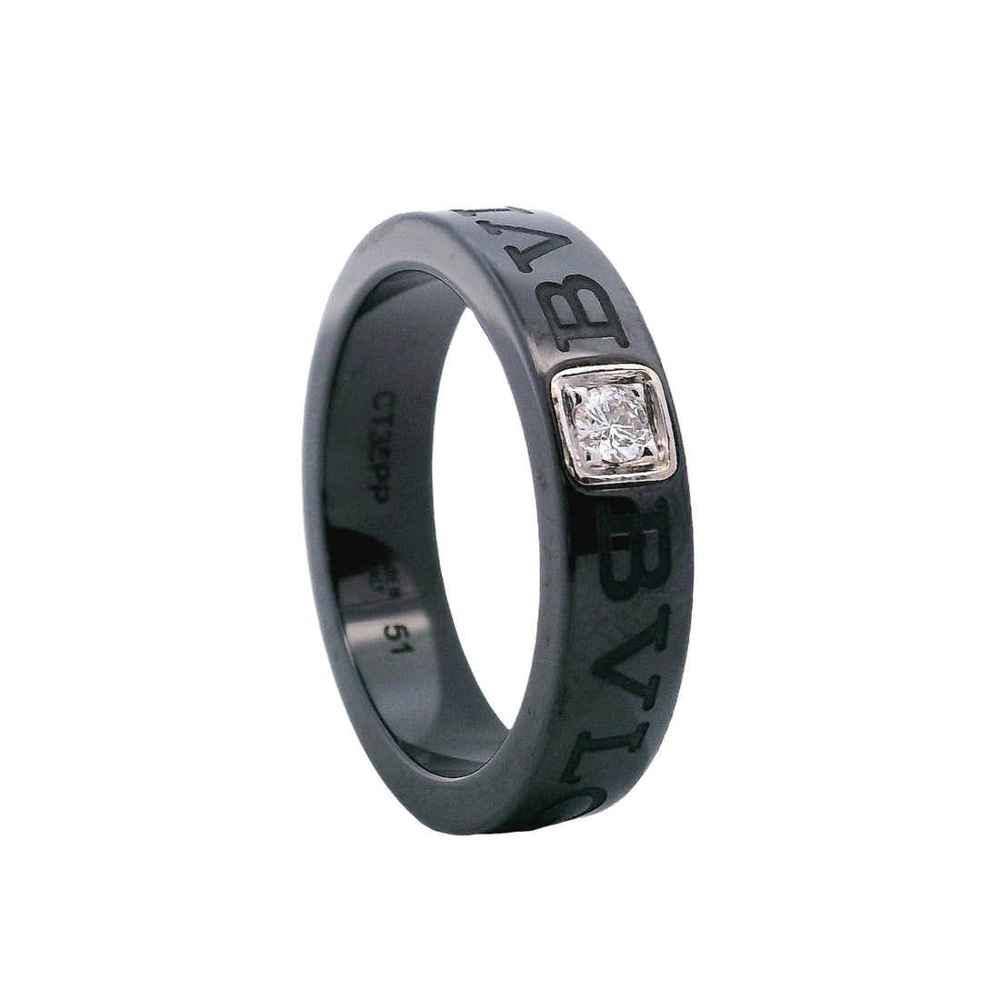 BVLGARI Bulgari 18kt white Gold & Ceramic Band Ring with Diamond: Striking Bvlgari Bulgari band crafted in sleek black ceramic with a polished 18K white gold inset, set with a round brilliant-cut diamond weighing approx. 0.05 ct (estimated E–F color, VS1 clari
