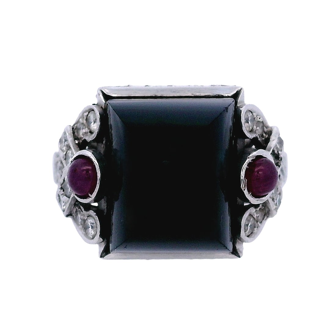 Art Deco revival Platinum Ring with Onyx, Diamonds and Rubies: Beautiful Art Deco revival Ring crafted in Platinum, set with a center Sugar Loaf Black Onyx weighing Approx 4.50 carats. accented with 34 Round cut Diamonds weighing together Approx. 0.35 carats. H c