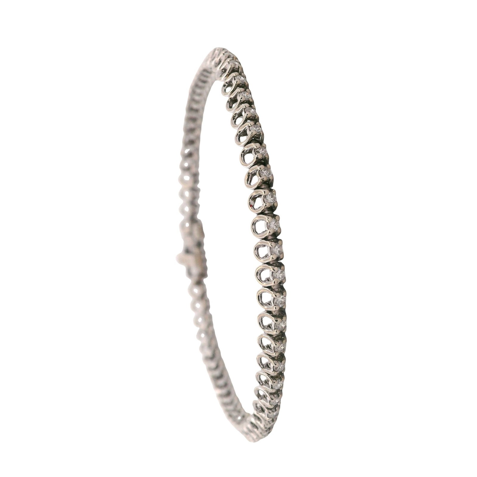 14K White Gold Tennis Bracelet with 1.00 CTW in Diamonds: A timeless staple with effortless sparkle, this 14K white gold tennis bracelet is set with 62 round-cut diamonds totaling approximately 1.00 carat (H–J color, VS2 clarity) for a continuous line 