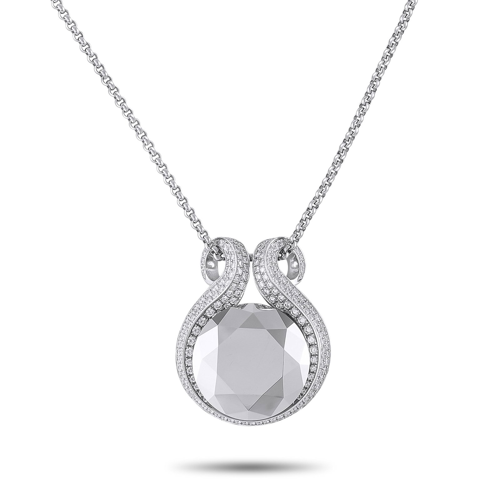 Chopard 18K White Gold Diamond and Hematite Necklace: This Chopard necklace is undeniably breathtaking. At the center of the 18K White Gold pendant, a bold Hematite center stone instantly draws the eye. Inset Diamonds add even more opulence to this uniqu