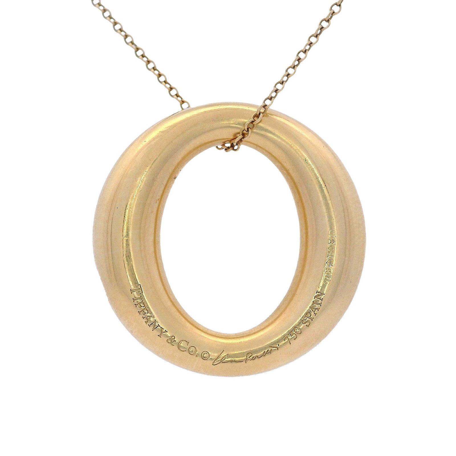 Tiffany & Co. Paloma Picasso 18kt yellow Gold Pendant Necklace: Tiffany & Co. Paloma Picasso 18kt yellow Gold Oval Pendant with Chain. Total weight: 5.80 grams. Diameter: 0.95 inches. Stamped on th Pendant "Tiffany & Co. Paloma Picasso Au750, Spain". Stamped on th