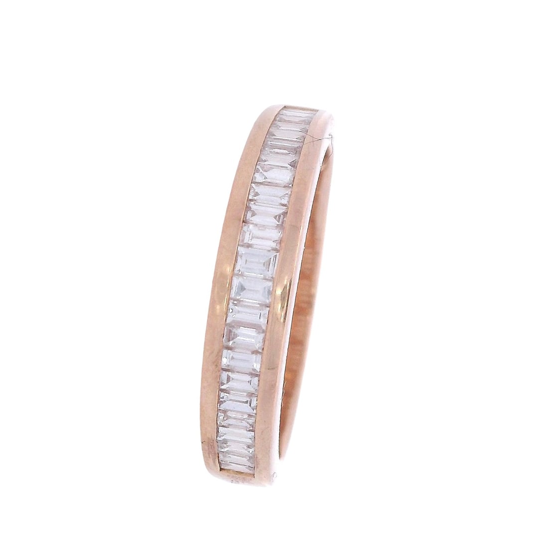 18kt yellow Gold Half Eternity Ring with 1.05 Cts in VVS Diamonds: Half Eternity Ring crafted form 18kt yellow Gold, accented with 23 calibrated with 23 Baguette cut Diamonds weighing Approx. 1.05 carats. F-G color, VVS1 clarity. Ring size: 7. Total weight: 3.5 grams