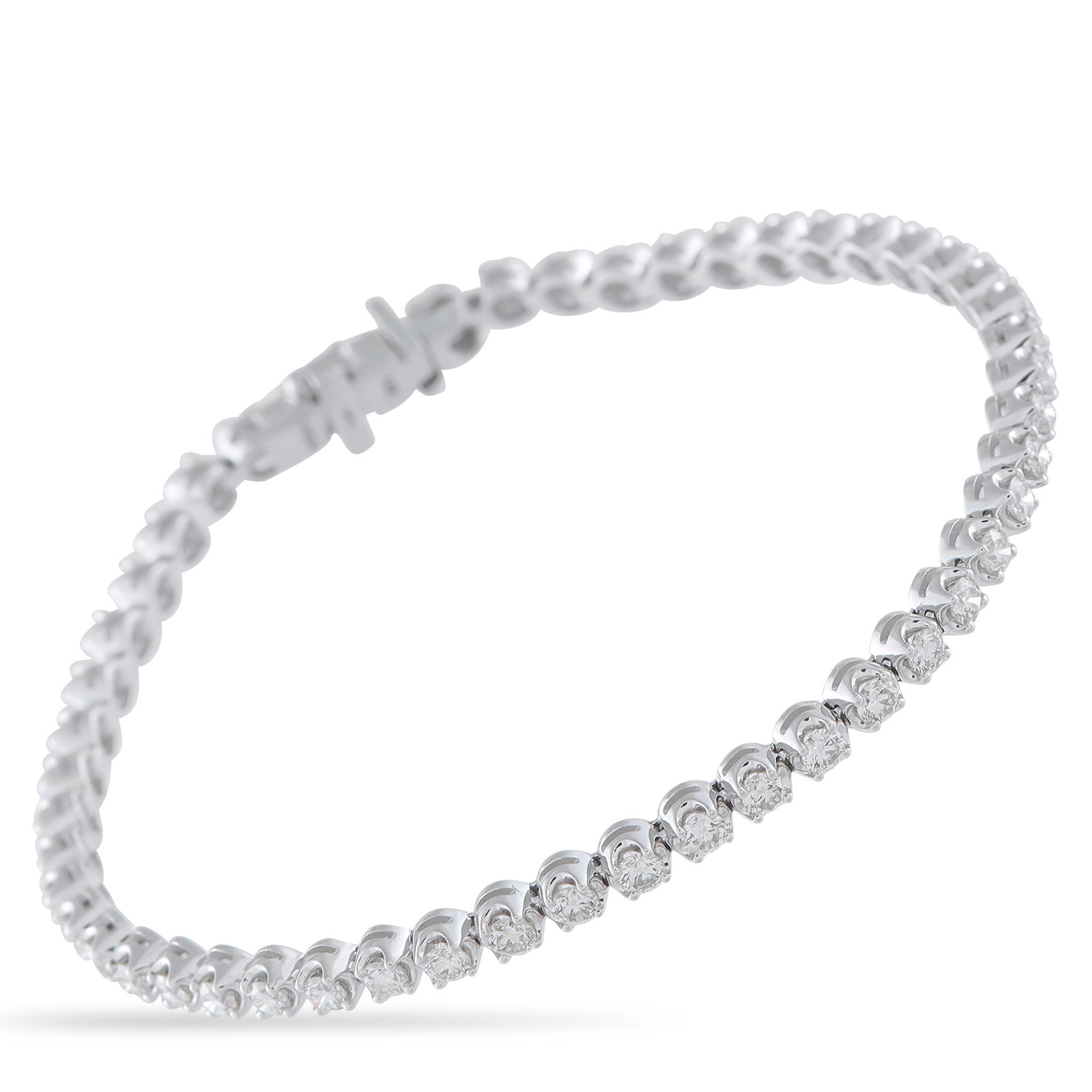 14K White Gold 2.55ct Diamond Tennis Bracelet: Day or night, this tennis bracelet adapts to any look. It's fashioned in 14K white gold and carries a total of 2.55 carats of diamonds, each set to catch light from every angle. The generous carat wei