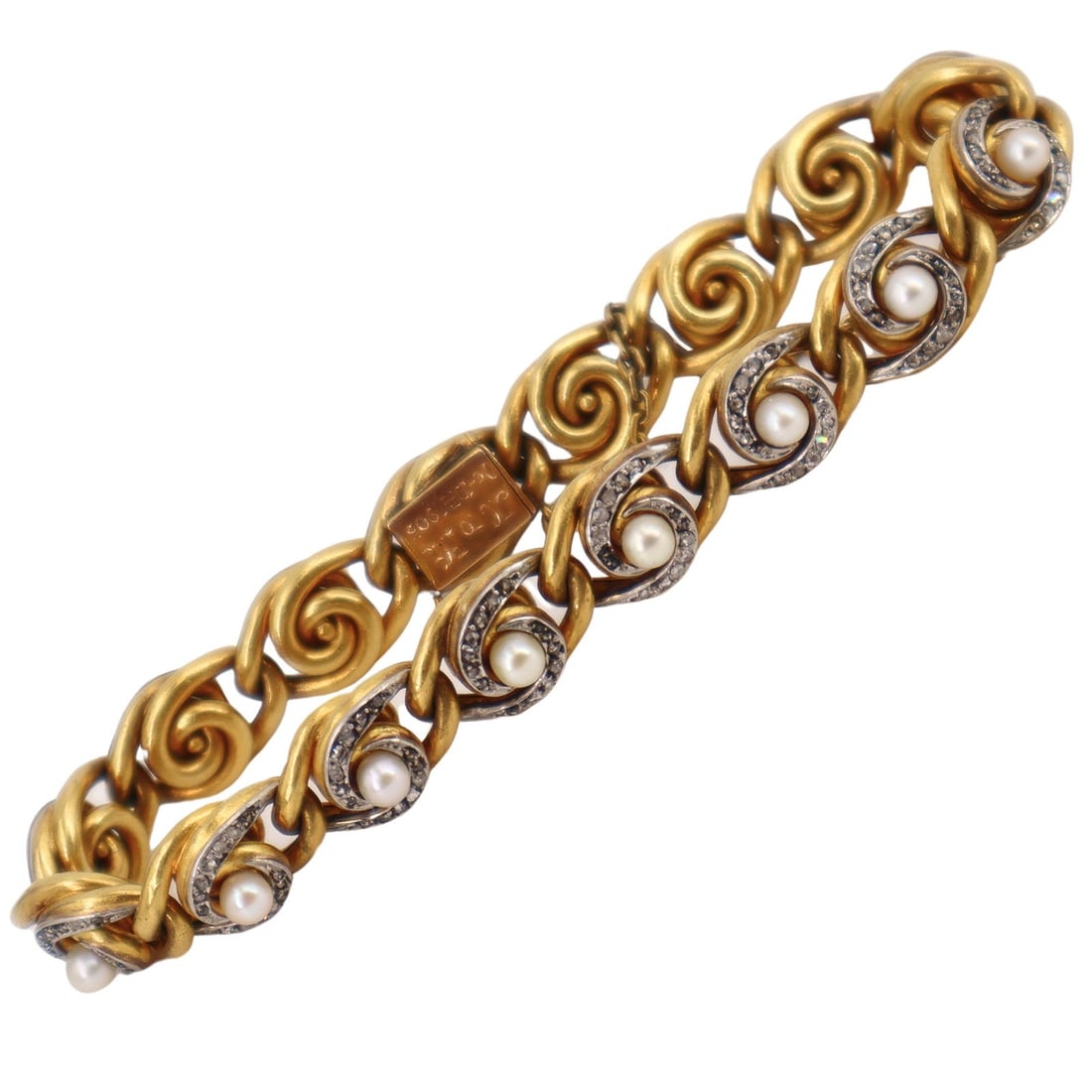 Art Nouveau French 18 kt Gold Bracelet with Pearls and Diamonds: This exceptional handcrafted bracelet, created during the Art Nouveau era in France, is made from 18kt yellow gold with intricate platinum detailing. It is adorned with 16 round cream pearls and rose-