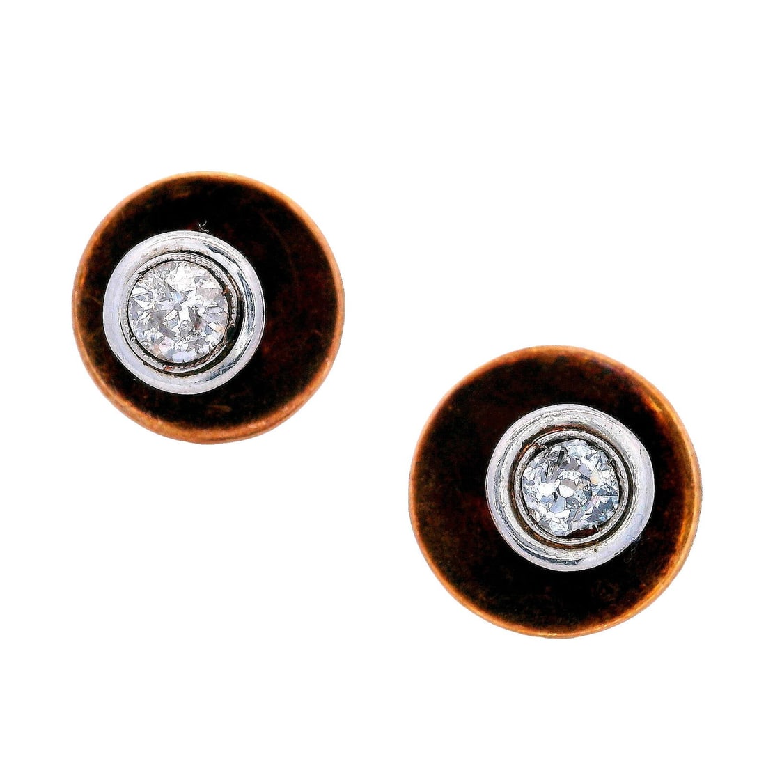 Antique pair of 14kt Gold and Platinum men's Shirt buttons with Diamonds: Antique pair of 14kt rose Gold and Platinum men's Shirt buttons set with two Old mine Diamonds weighing together approx. 0.85 carats. H-J color (graded colorless), I1 clarity. Diameter: 0.52 inches. T