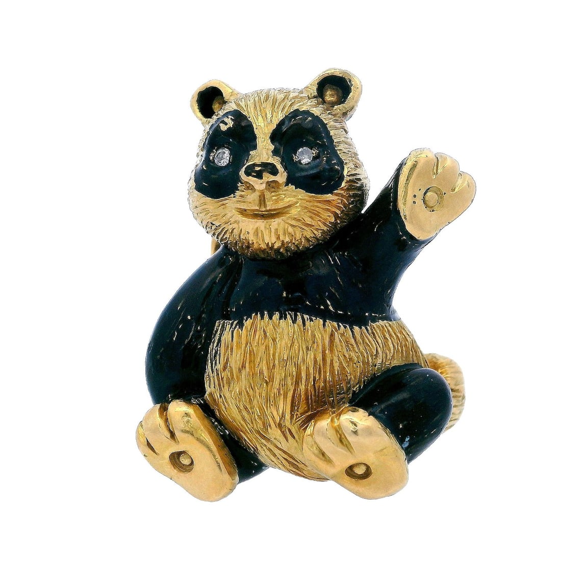 18kt Gold Enamel Panda Pin Brooch with Diamonds: Beautiful Panda Brooch crafted in 18kt yellow Gold with applications of Black Enamel. Accented with two Round cut Diamonds for the eyes. Weight (without the secure pin): 18.0 grams. Measurements: 1.1 