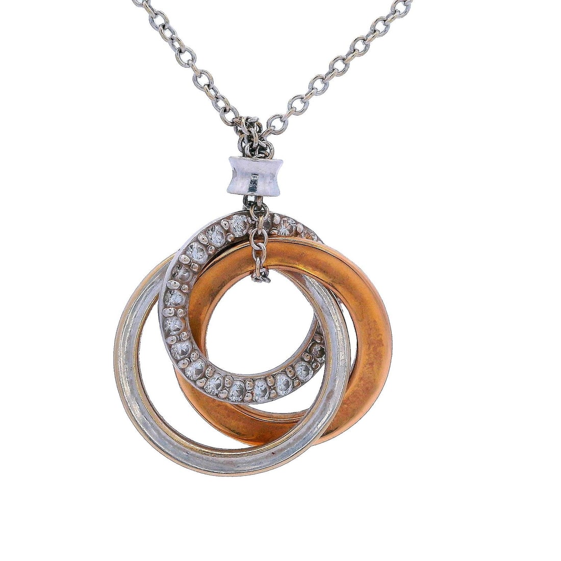 Tiffany & Co. Triple interlocking Diamonds Necklace in 18kt Gold: Tiffany & Co. Triple Interlocking Diamonds Necklace, crafted with exquisite attention to detail in 18kt rose and white gold. This elegant piece features three interlocking circles, with one circle bea