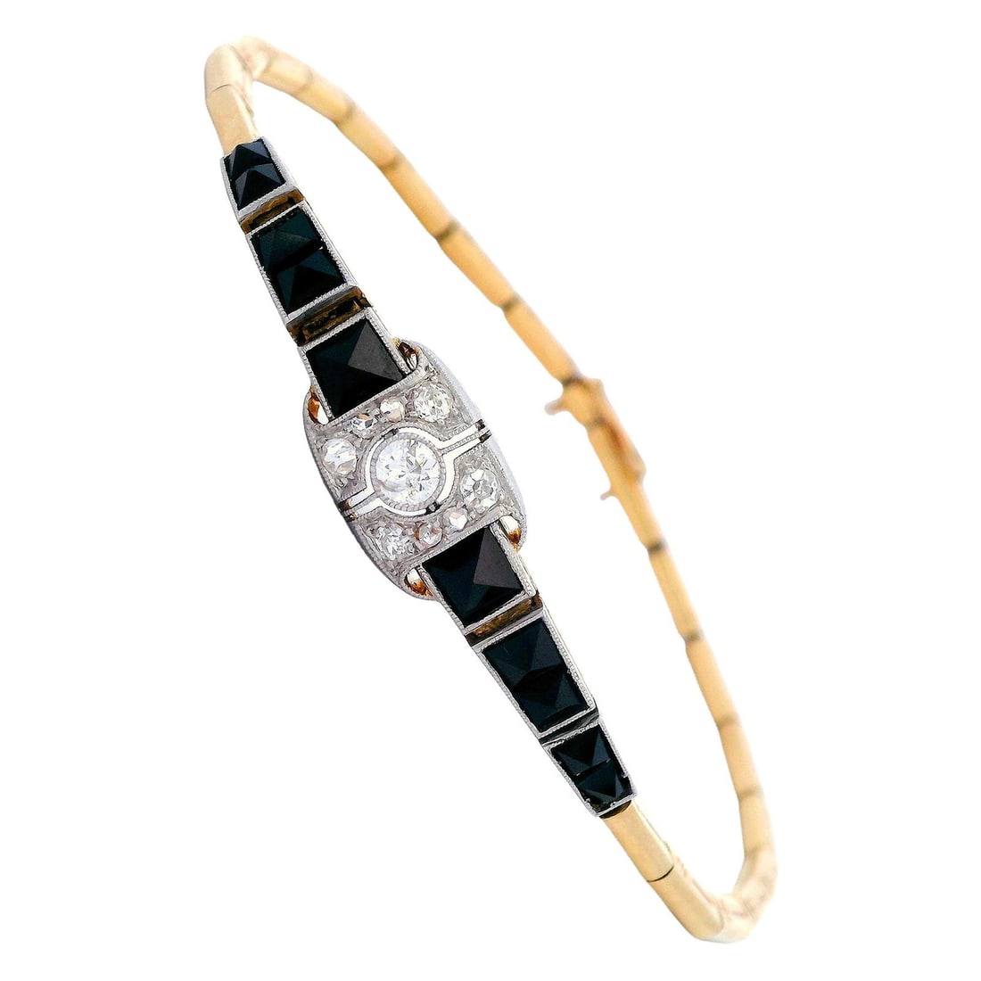Art Deco 1920 Bracelet in 18kt Yellow Gold with Diamonds and Onyx: This stunning Art Deco bracelet measuring 6.50 inches weighs 8.6 grams and is expertly crafted in luxurious 18k yellow gold and platinum. Features a captivating old mine diamond centerpiece complement
