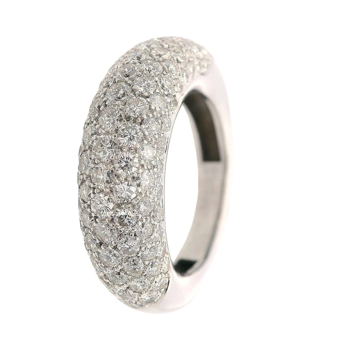CHAUMET Paris Anneau Paris 18kt White Gold Dome Ring with Diamonds: This exquisite 1980s vintage ring from Chaumet's celebrated Anneau collection in size 7 (sizable) weighs 8.4 grams and is expertly crafted in 18k white gold with a width of 0.30 inches. Features a bre