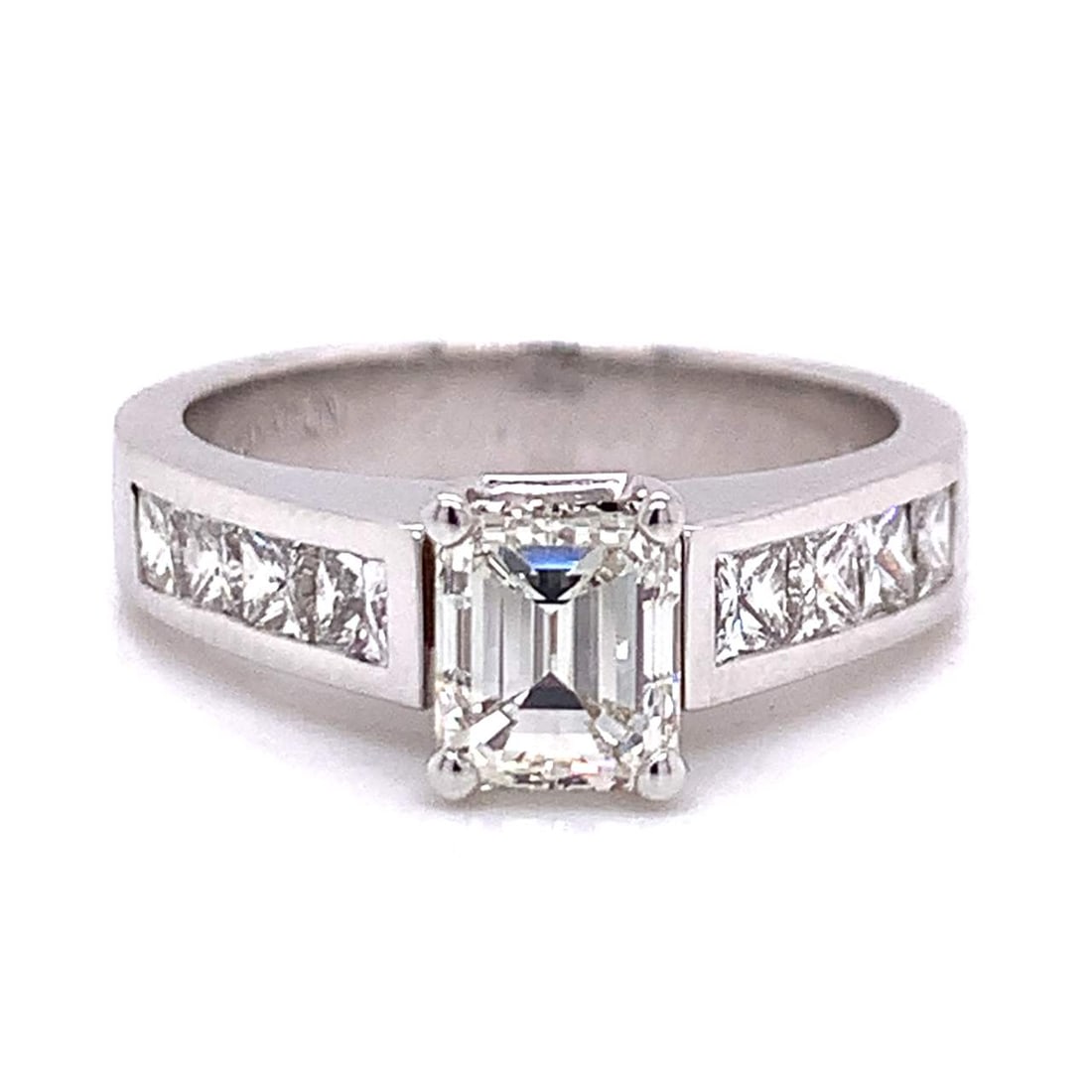 GIA 18K White Gold Ring with 2.00 CTW in Diamond: 18K white gold diamond ring set with a 1.00 CTW GIA certified emerald-cut diamond in I color and VS1 clarity, accented with eight diamonds totaling approximately 1.00 CTW in G–H color and VS1 cl