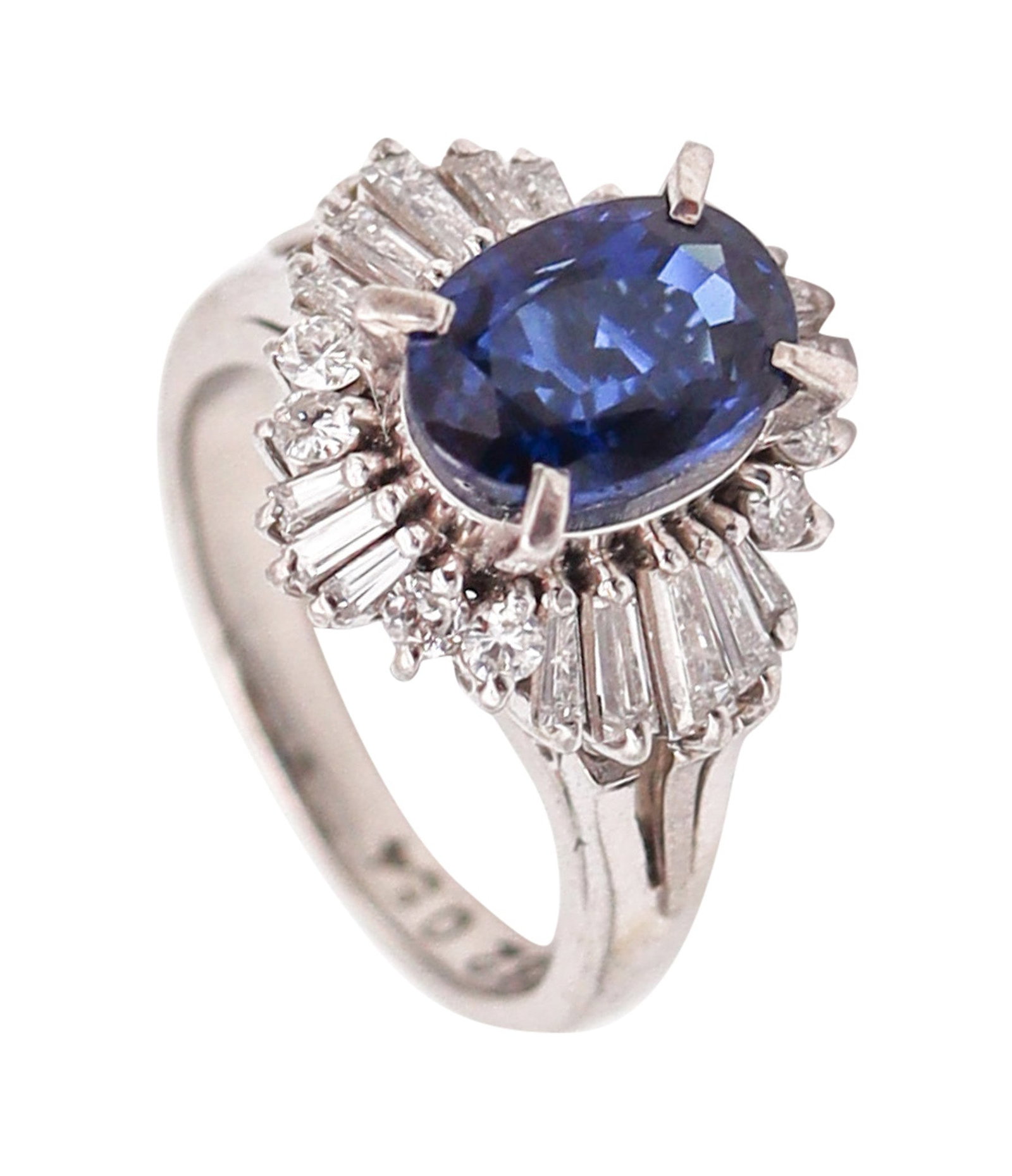 BALLERINA Classic Ring In Platinum With 2.38 Ctw In Sapphires And Diamonds: Beautiful contemporary ballerina ring, crafted in solid .900 platinum with a high-polish finish and a classic flared “ballerina” silhouette. Centered with an oval faceted vivid royal-blue 